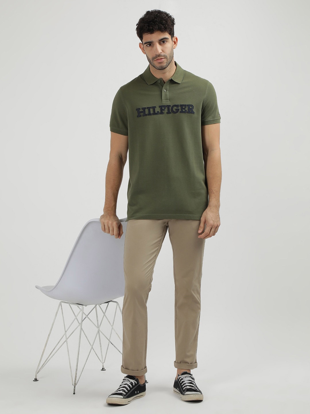 

Tommy Hilfiger Men Typography Printed High Neck Pockets T-shirt, Green