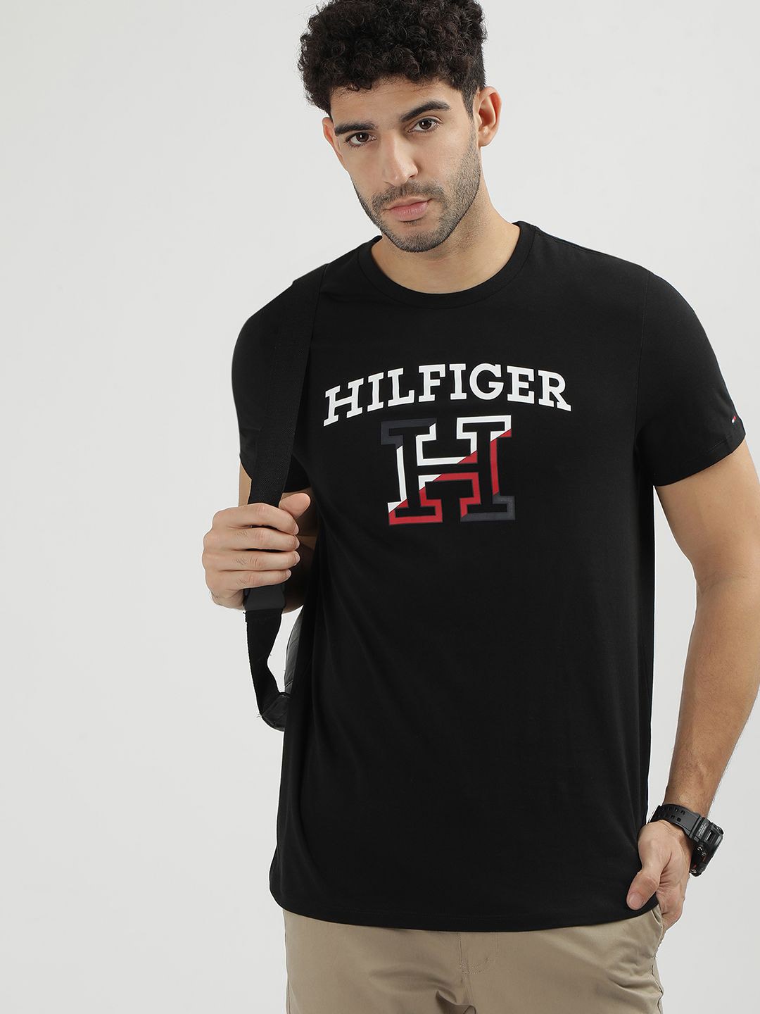 

Tommy Hilfiger Men Solid Typography Printed Applique T-shirt, Black