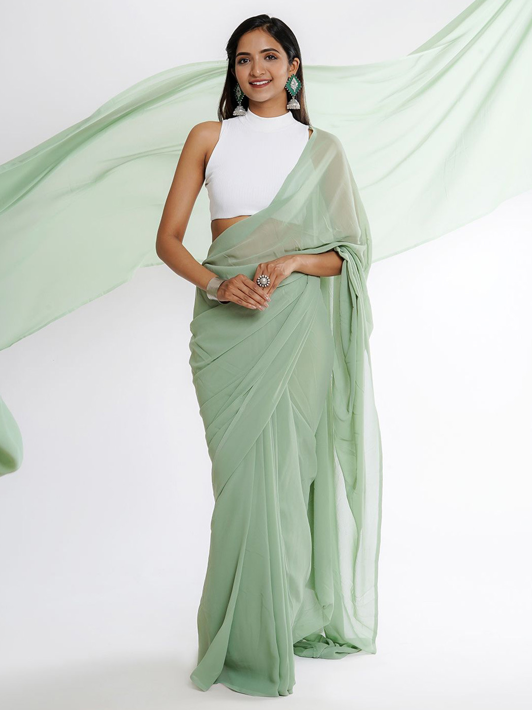 

TEEJH Solid Georgette Saree, Green