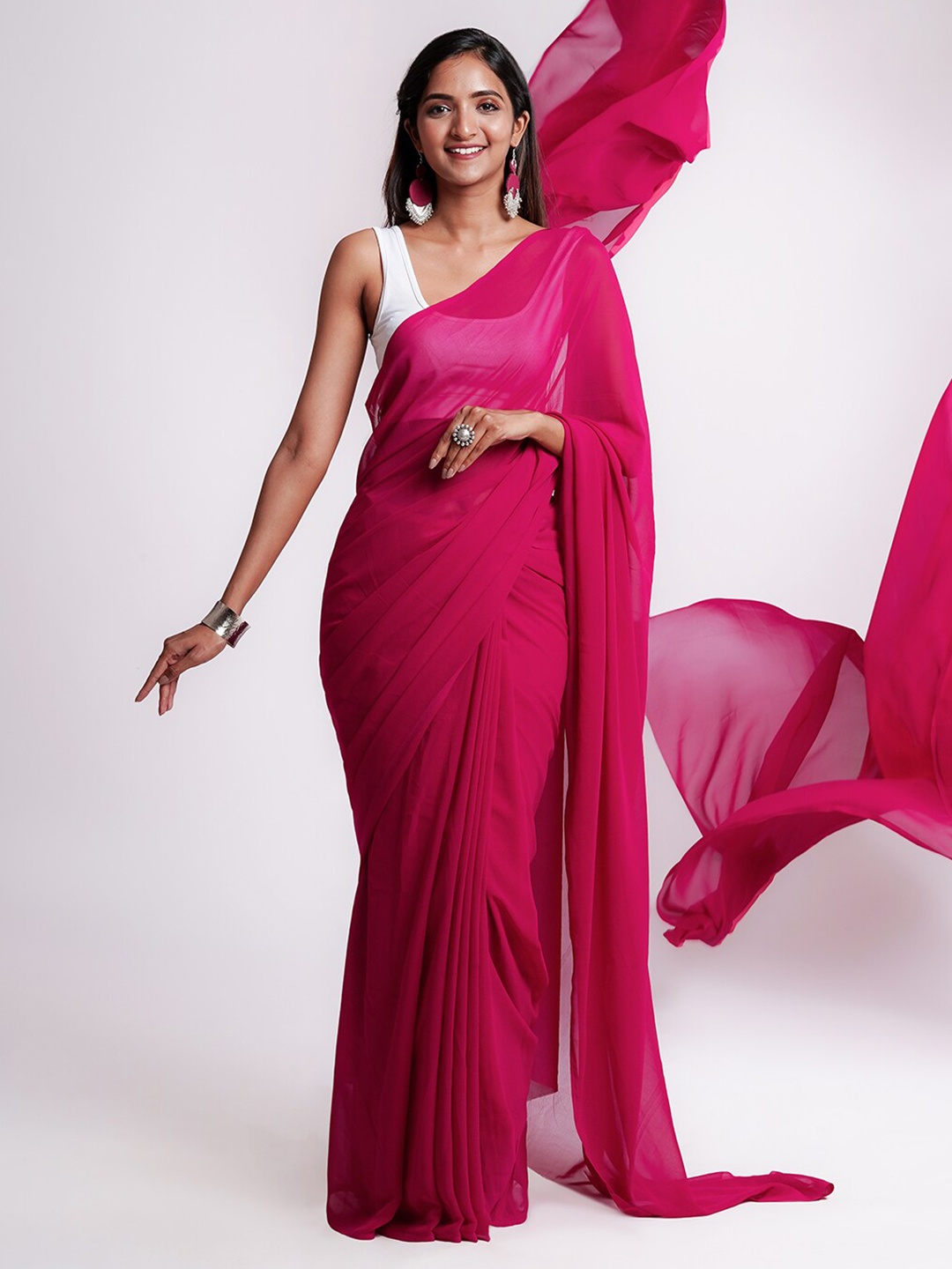 

TEEJH Solid Poly Georgette Saree, Magenta