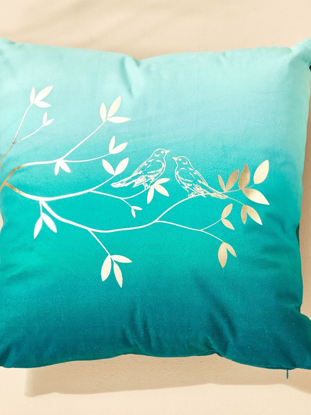 

Home Centre Splendid Gold Crest Teal Blue & White Printed Filled Cushion