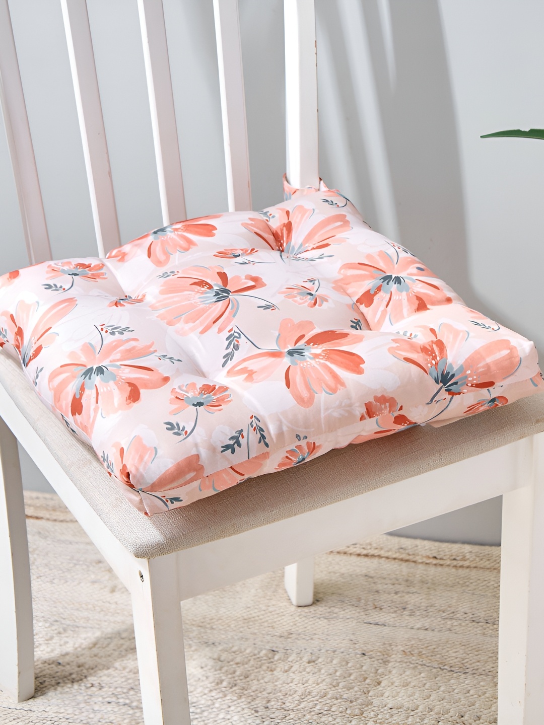 

Home Centre Peach & White Floral Printed Chair Pad