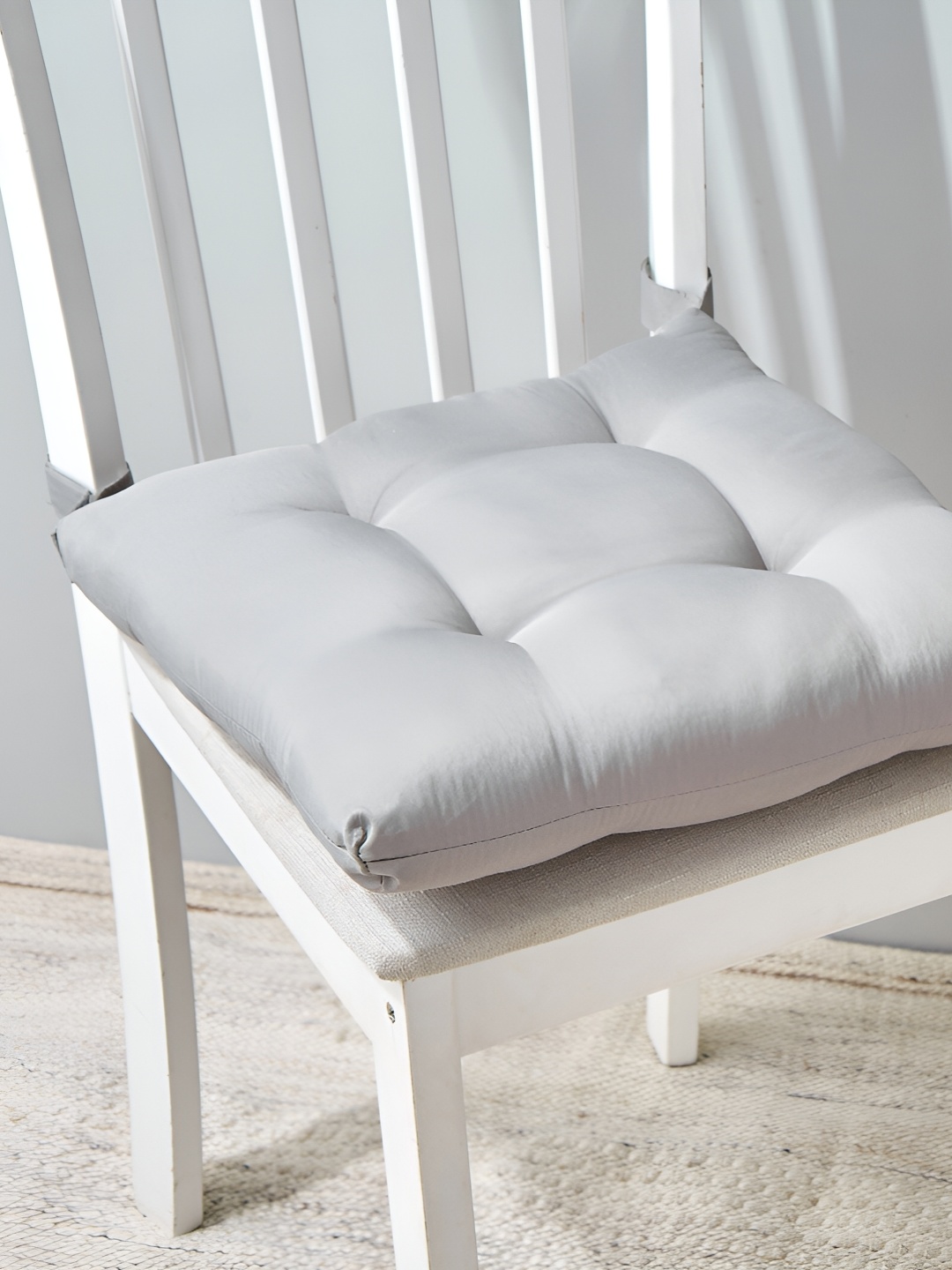 

Home Centre Grey Square Chair Pad