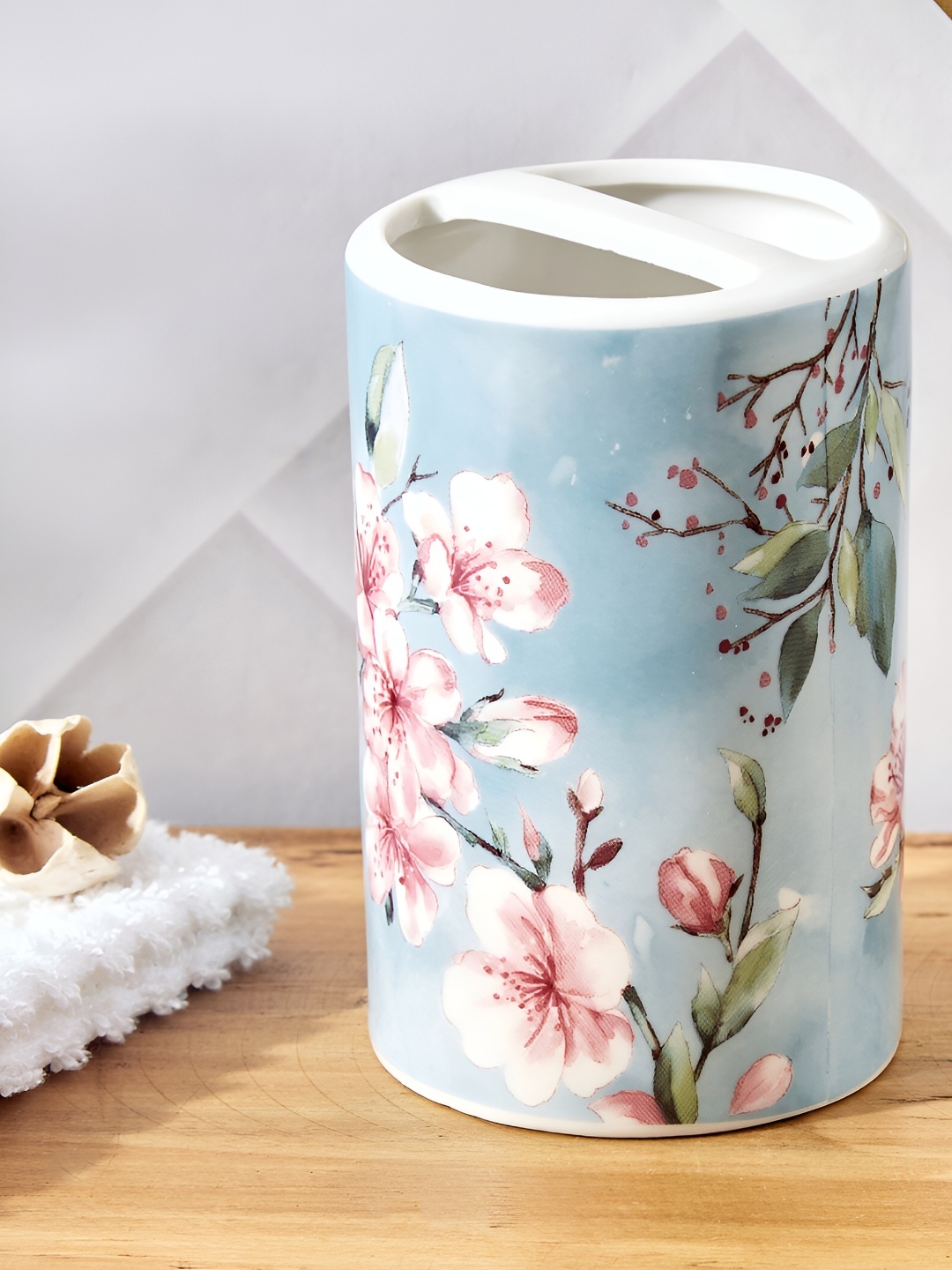 

Home Centre Blue & White Floral Ceramic Toothbrush Holder