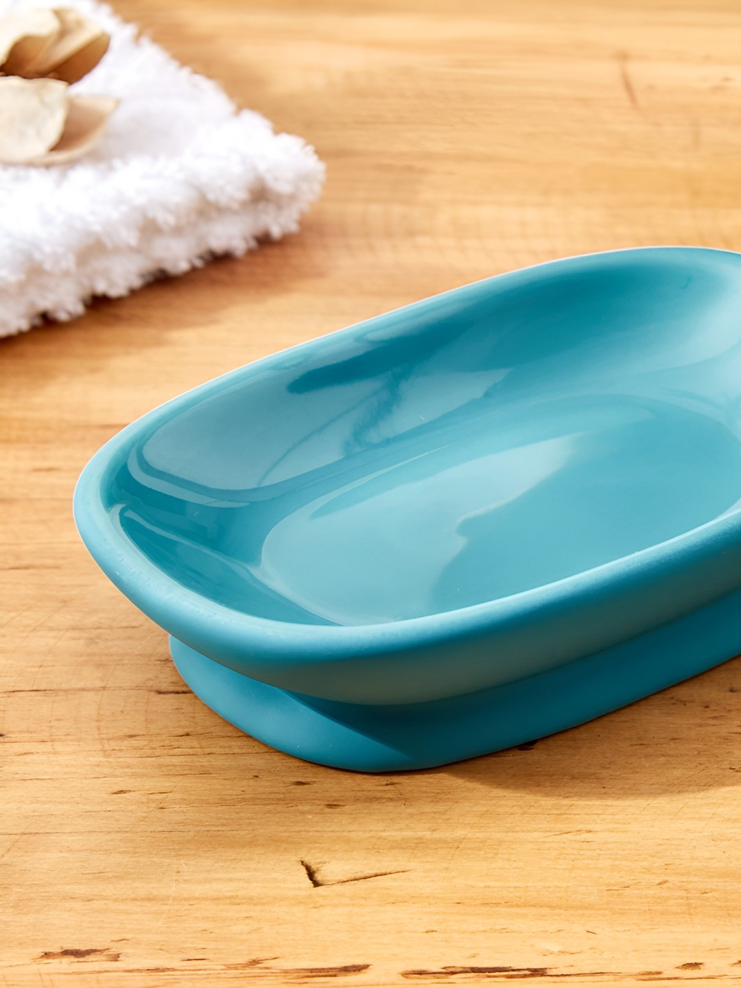 

Home Centre Blue Solid Ceramic Soap Dish