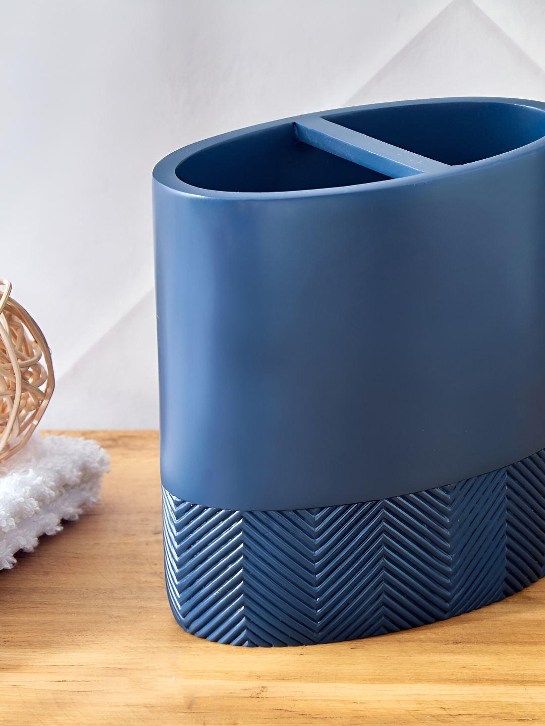 

Home Centre Blue Textured Polyresin Toothbrush Holder