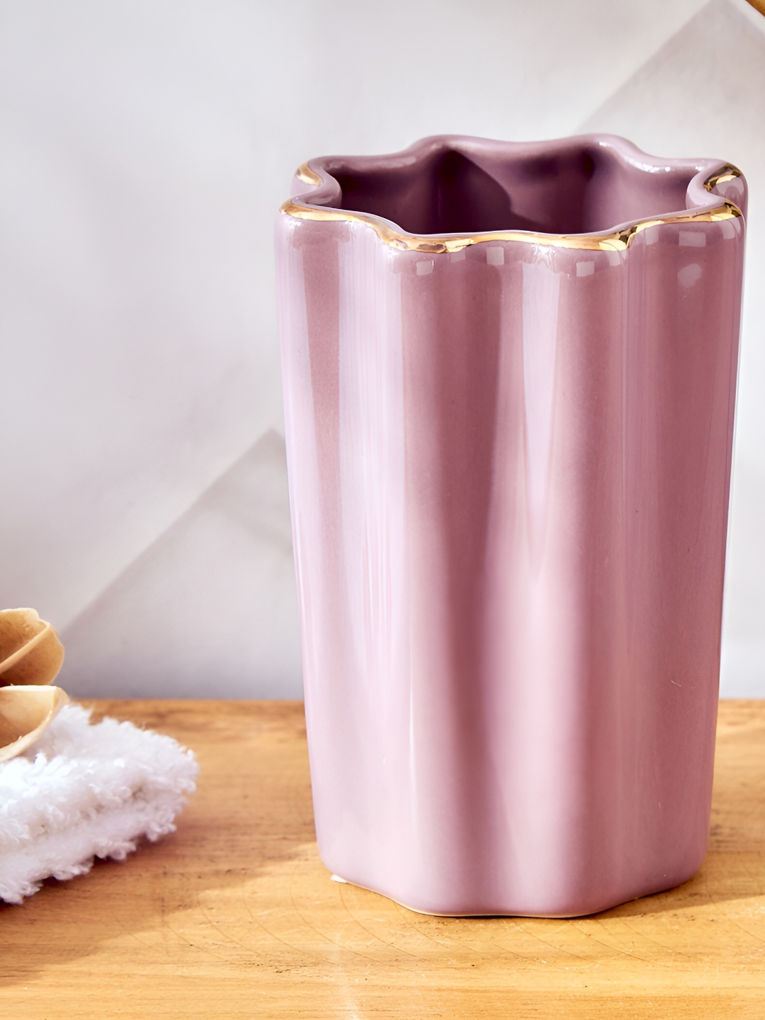 

Home Centre Purple Textured Ceramic Toothbrush Holder