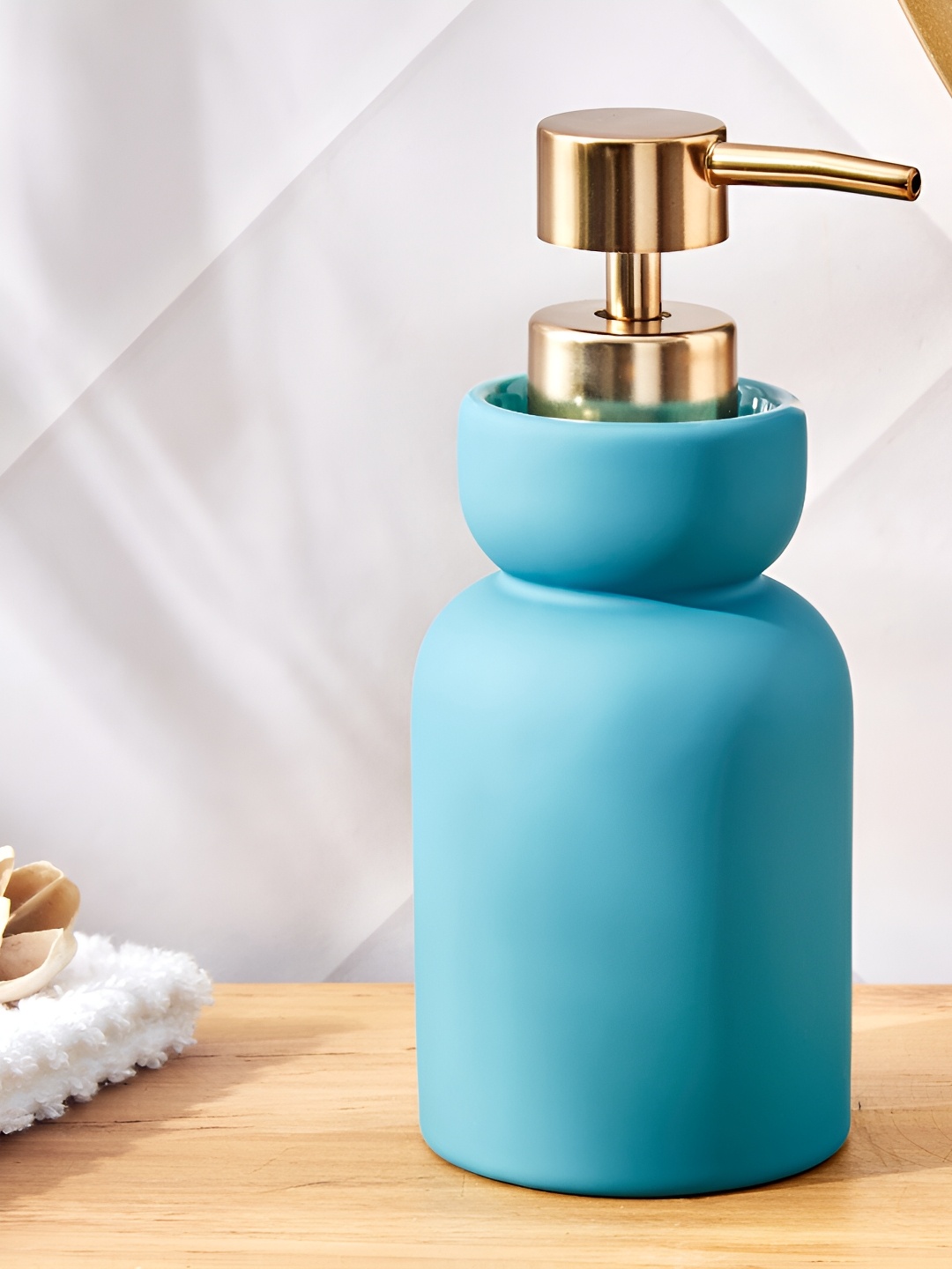 

Home Centre Blue Solid Ceramic Soap Dispenser