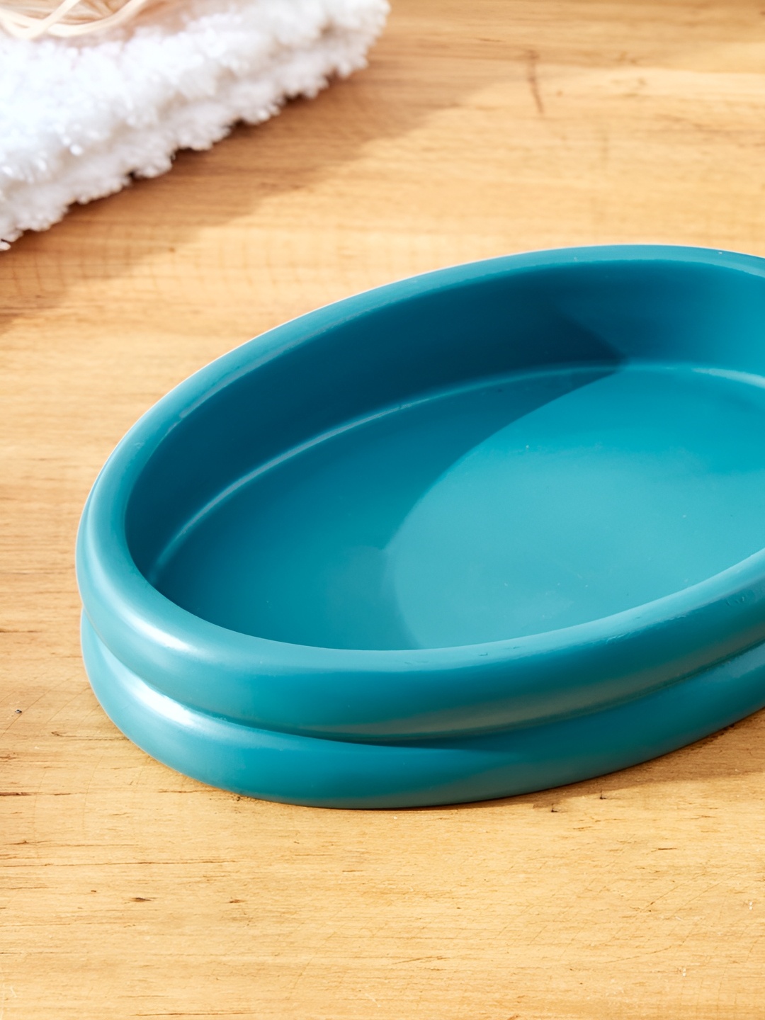 

Home Centre Teal Textured Polyresin Soap Dish