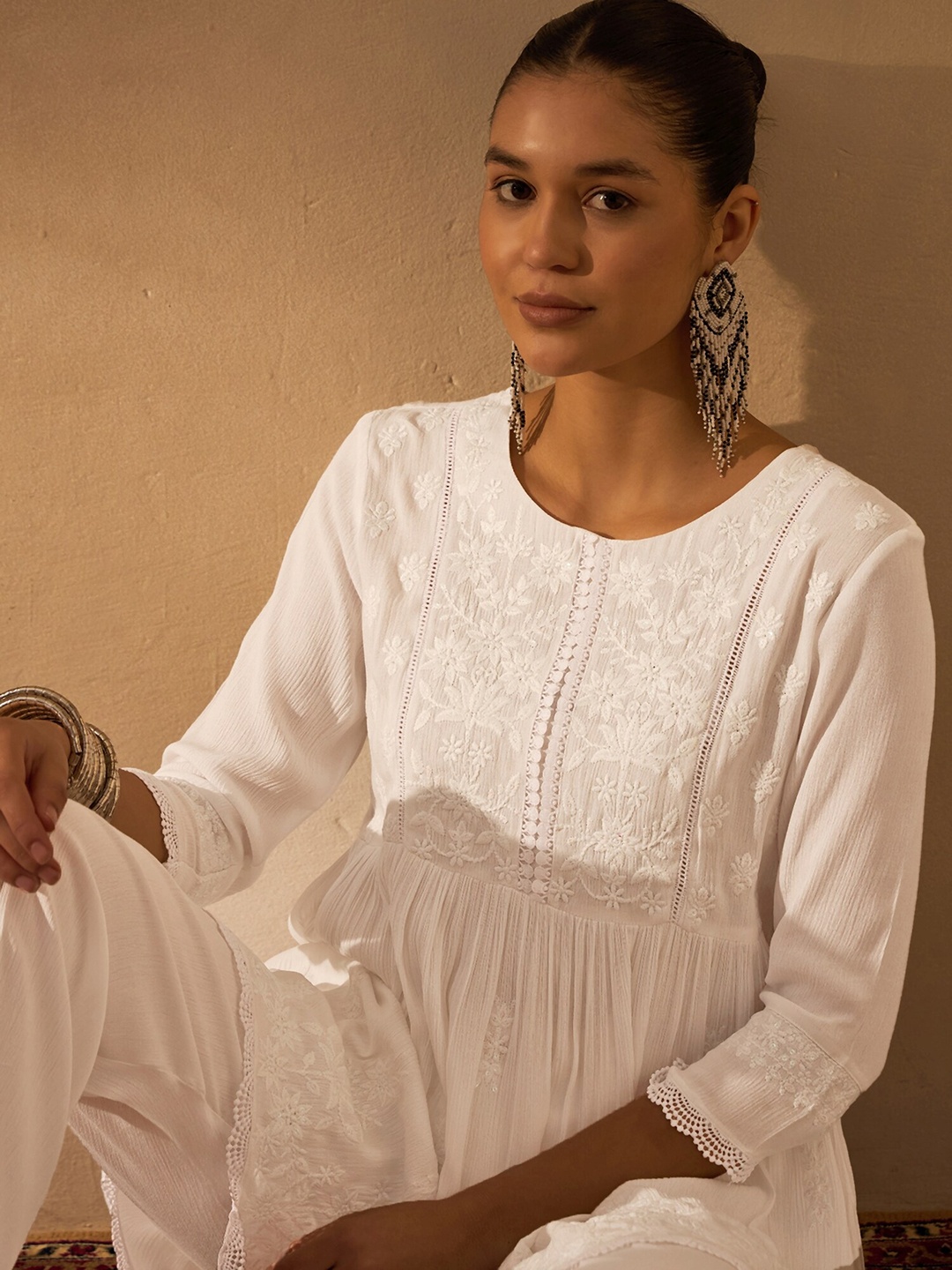 

Anouk Women Embroidered Empire Chikankari Kurti with Pants, White