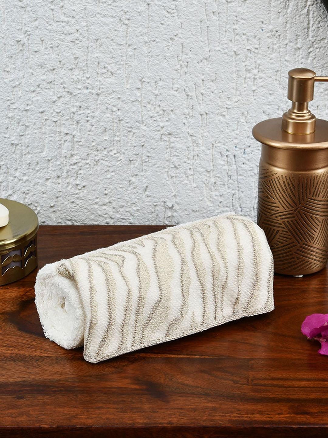 

Athome by Nilkamal Cream Colored 500 GSM Cotton Hand Towel