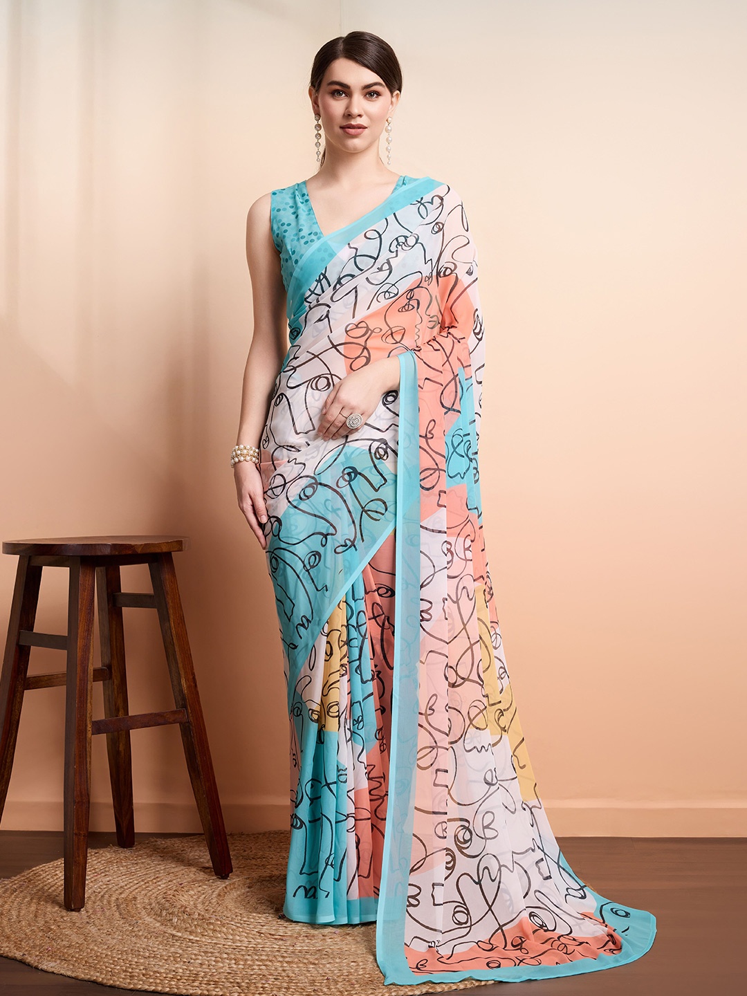 

RACHNA Worli Face Prints Multicolor Weightless Pure Georgette Saree, Blue