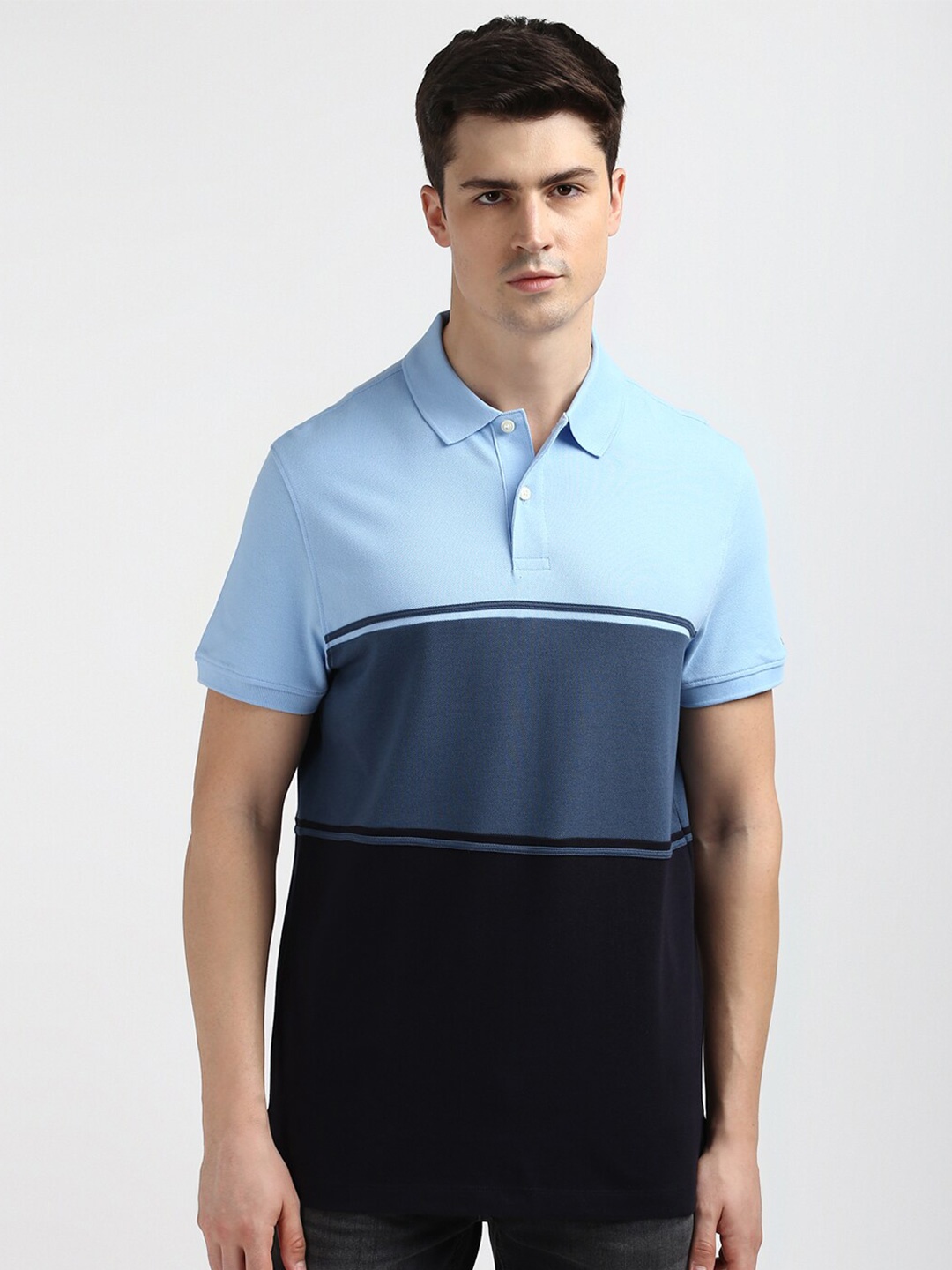 

Tommy Hilfiger Men Polo Collar Colourblocked T-shirt, Blue