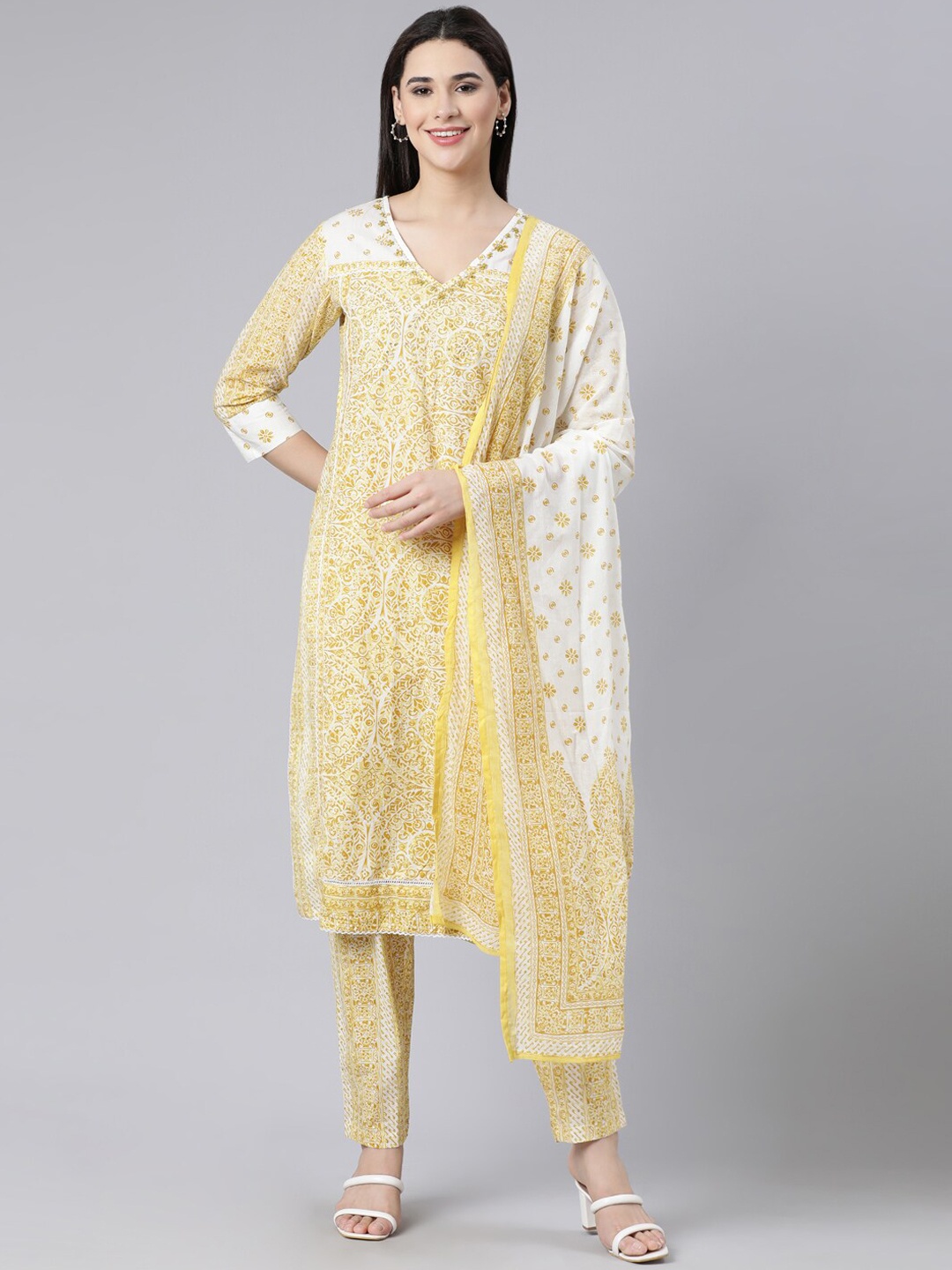 

Neerus Women Floral Printed Sequinned Pure Cotton Kurta with Trousers & With Dupatta, Yellow