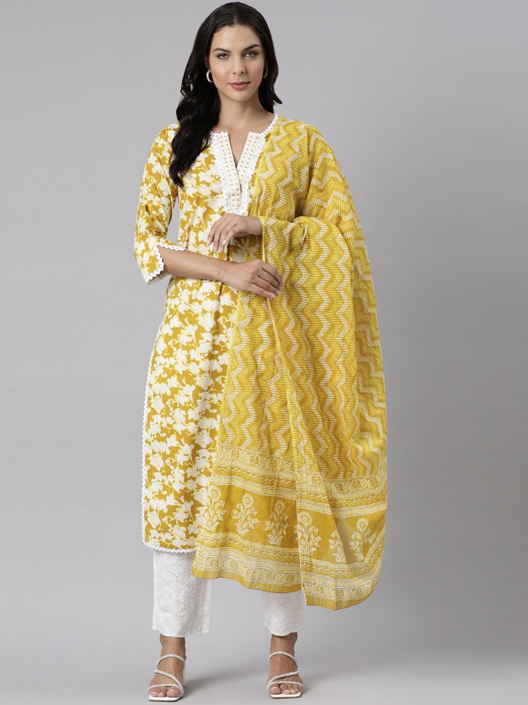 

Neerus Women Floral Printed Regular Pure Cotton Kurta with Trousers & With Dupatta, Yellow