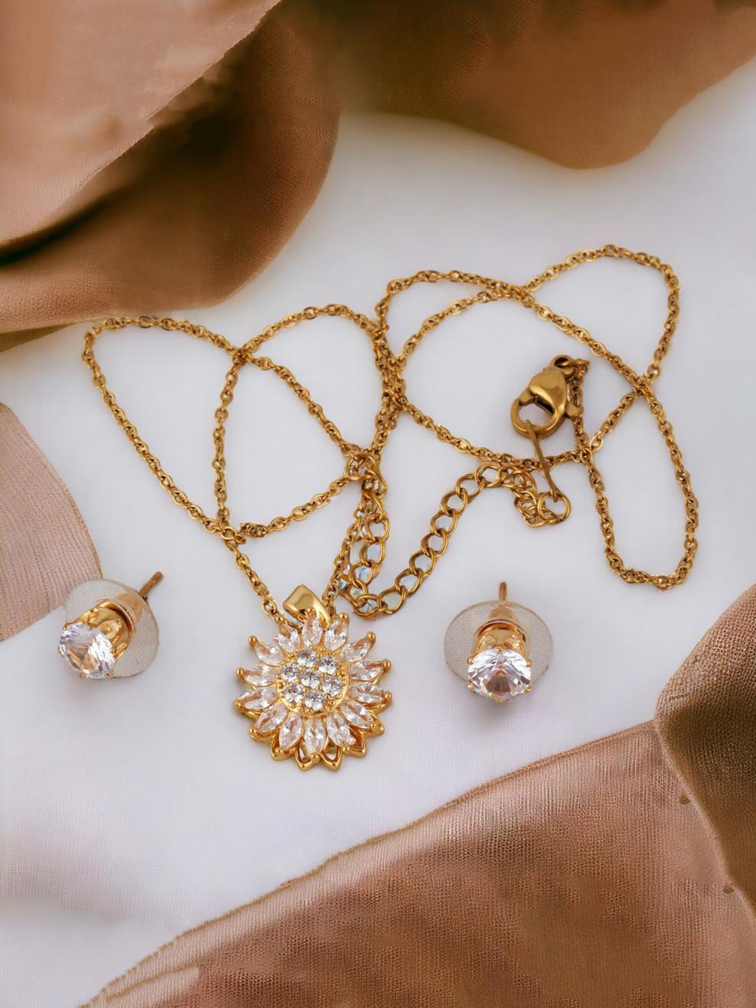 

LUCKY JEWELLERY Gold-Plated AD-Studded Floral Pendant and Earrings Jewellery Set