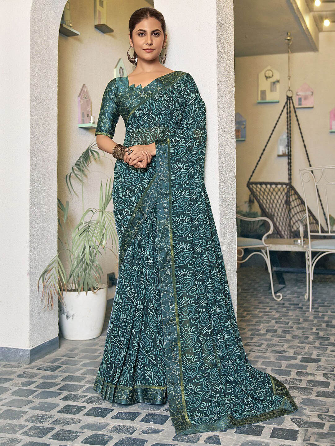 

Mitera Floral Pure Georgette Saree, Teal