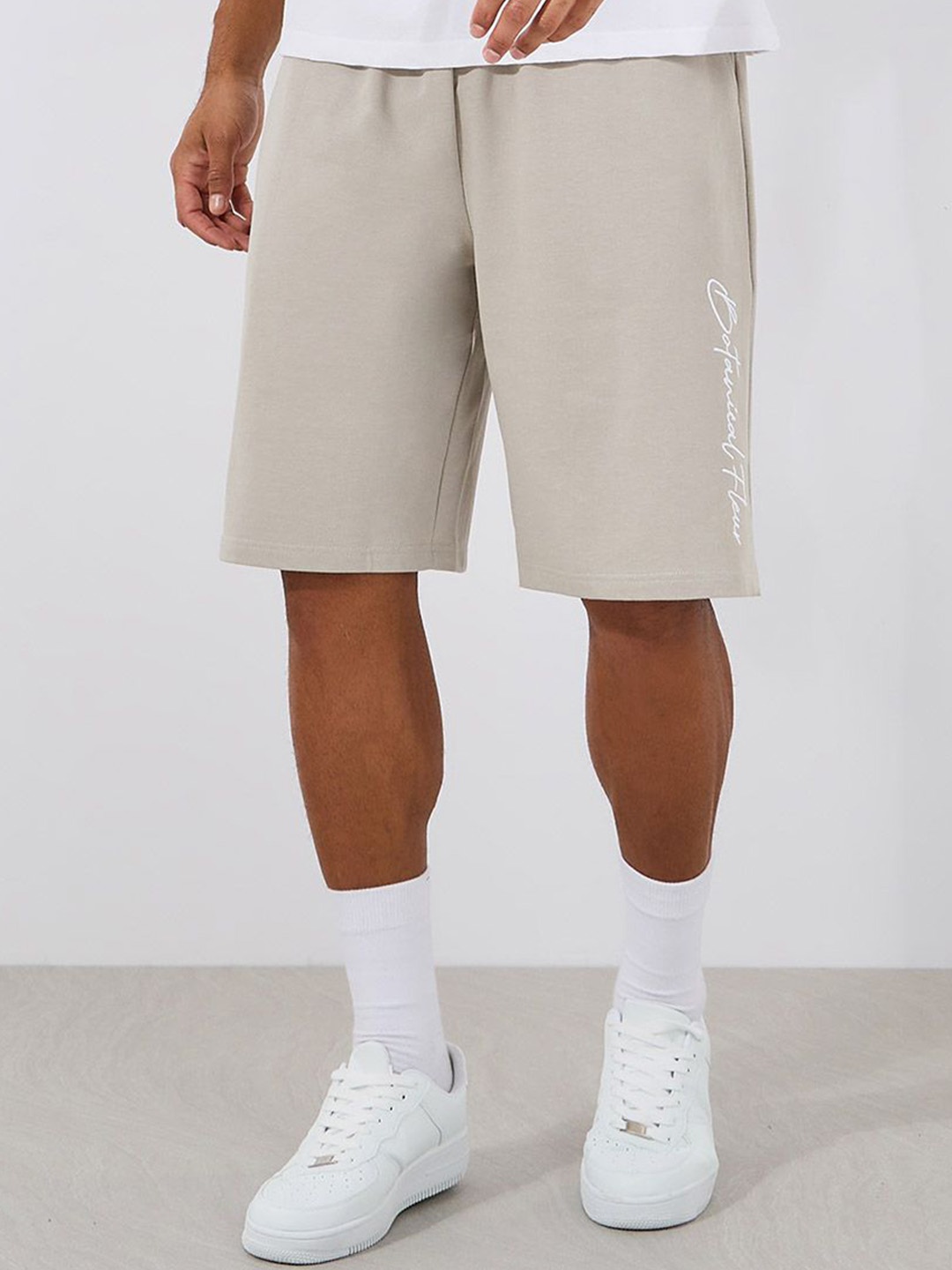 

Styli Men Slogan Print Oversized Cotton Terry Shorts, Beige