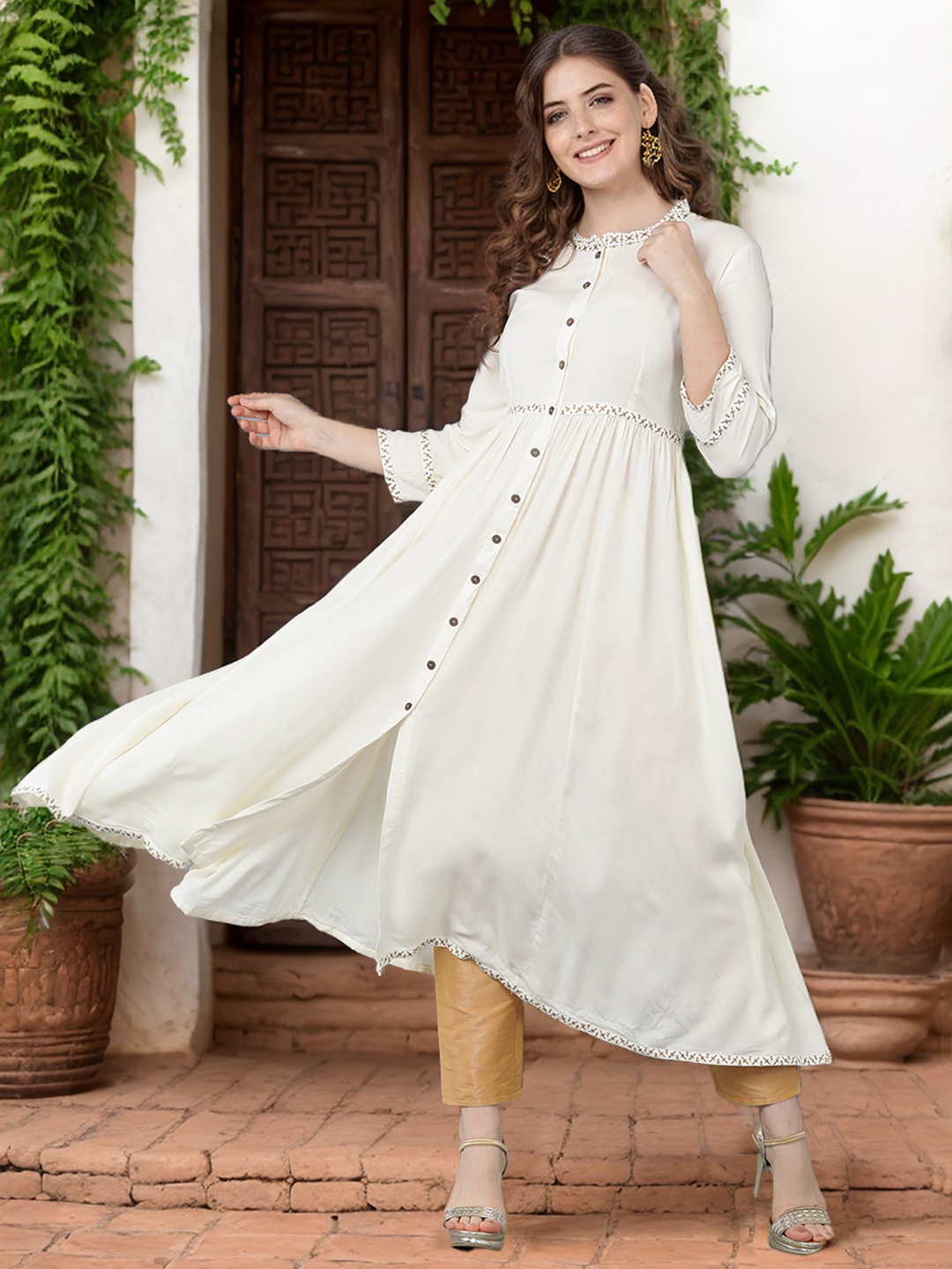 

Anouk Thread Work Mandarin Collar Empire A-Line Kurta, Cream