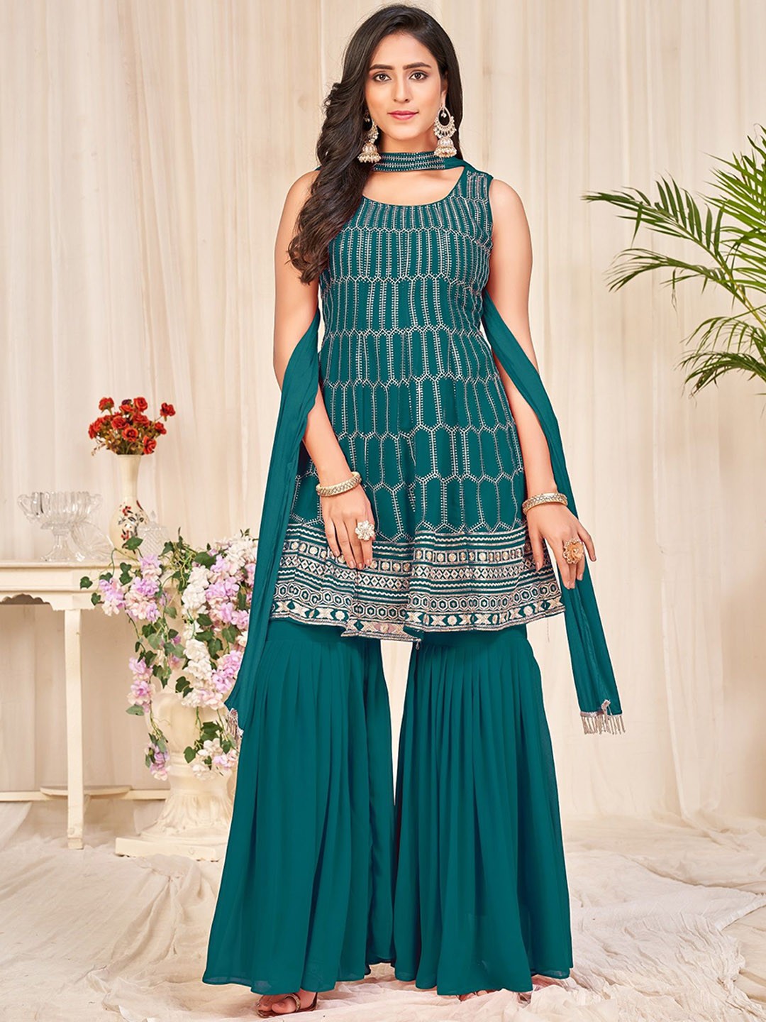 

Warthy Ent Embroidered Regular Sequinned Kurti With Sharara & Dupatta, Turquoise blue