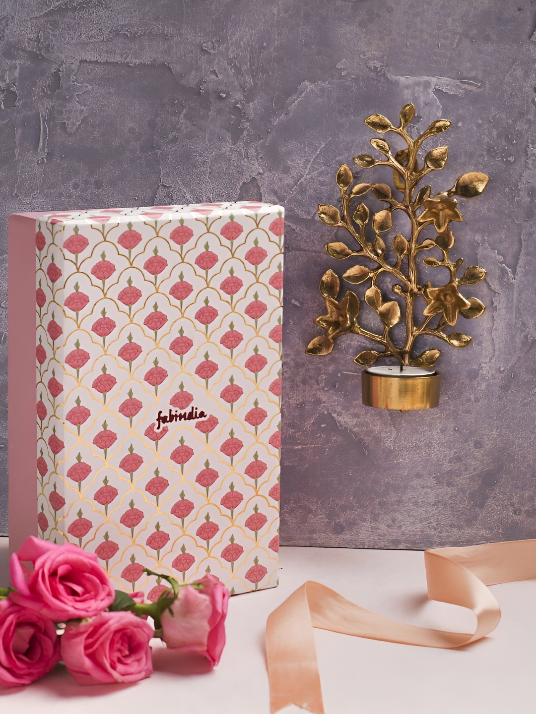 

Fabindia Gold-Toned Metal Candle Holder