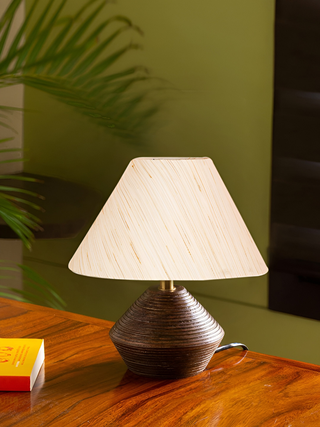 

Devansh Off White Textured Wooden Contemporary Frustum Shaped Table Lamp