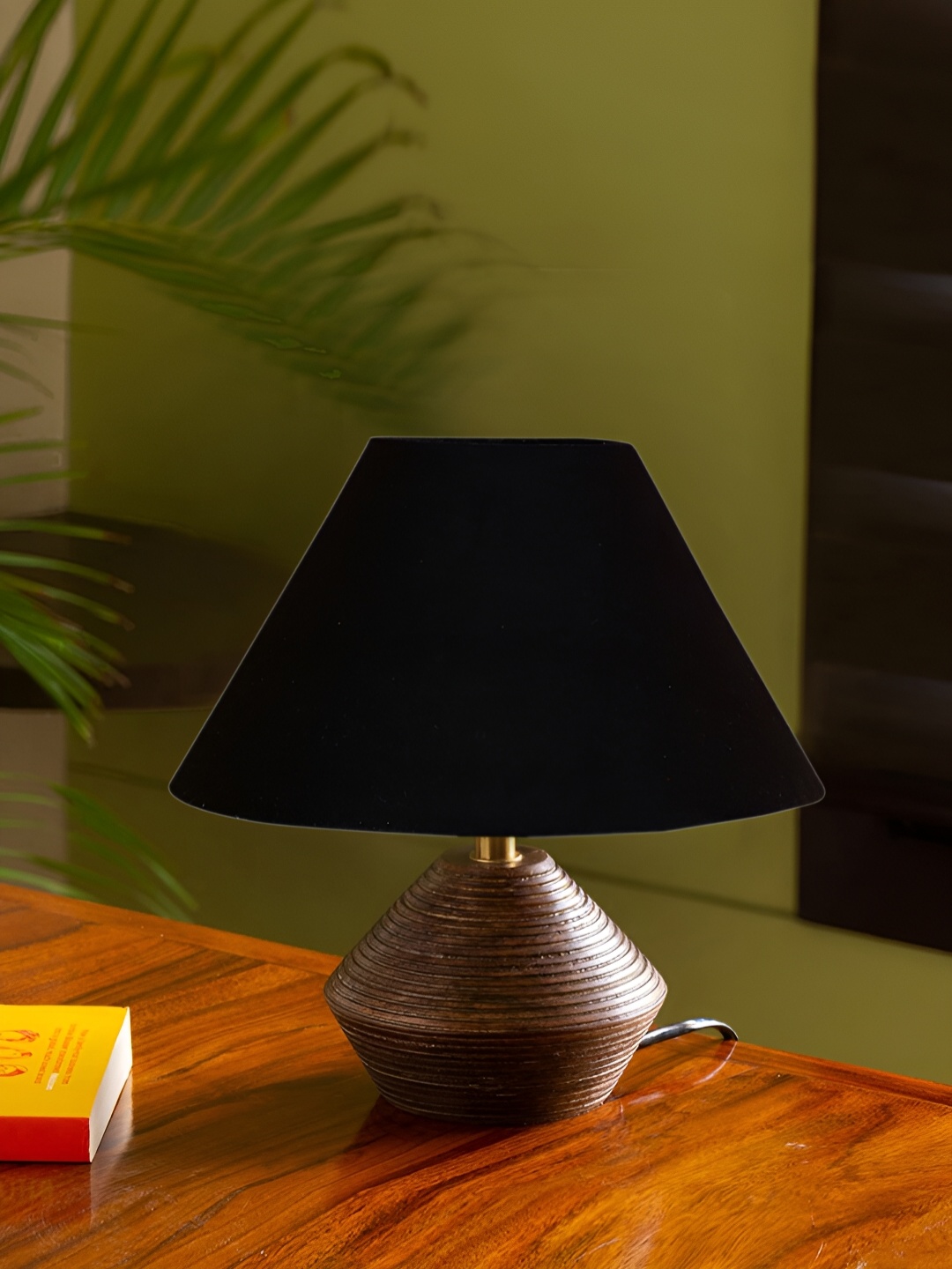 

Devansh Black Textured Wooden Contemporary Frustum Shaped Table Lamp