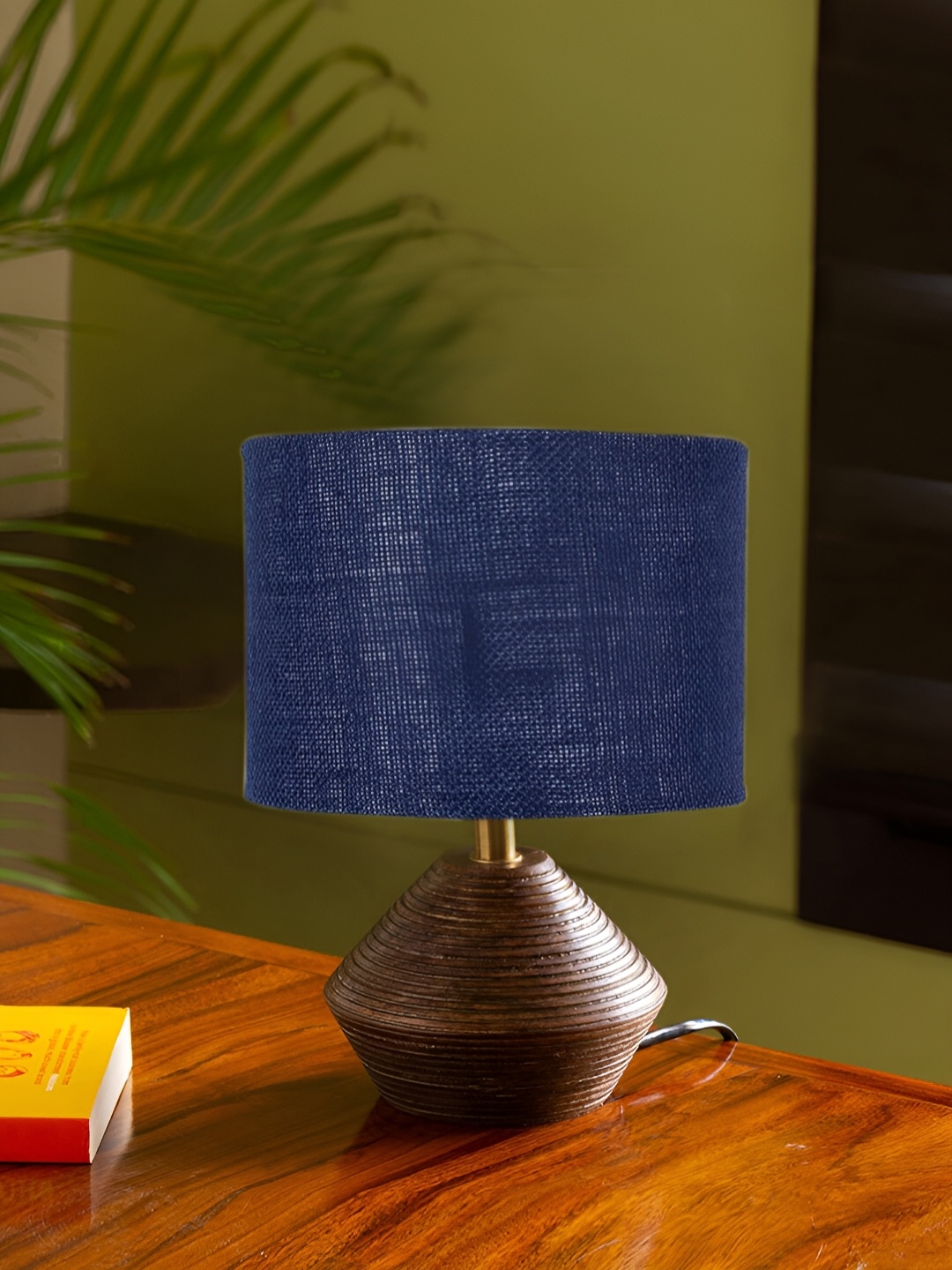 

Devansh Blue Wooden Contemporary Abstract Shaped Table Lamp
