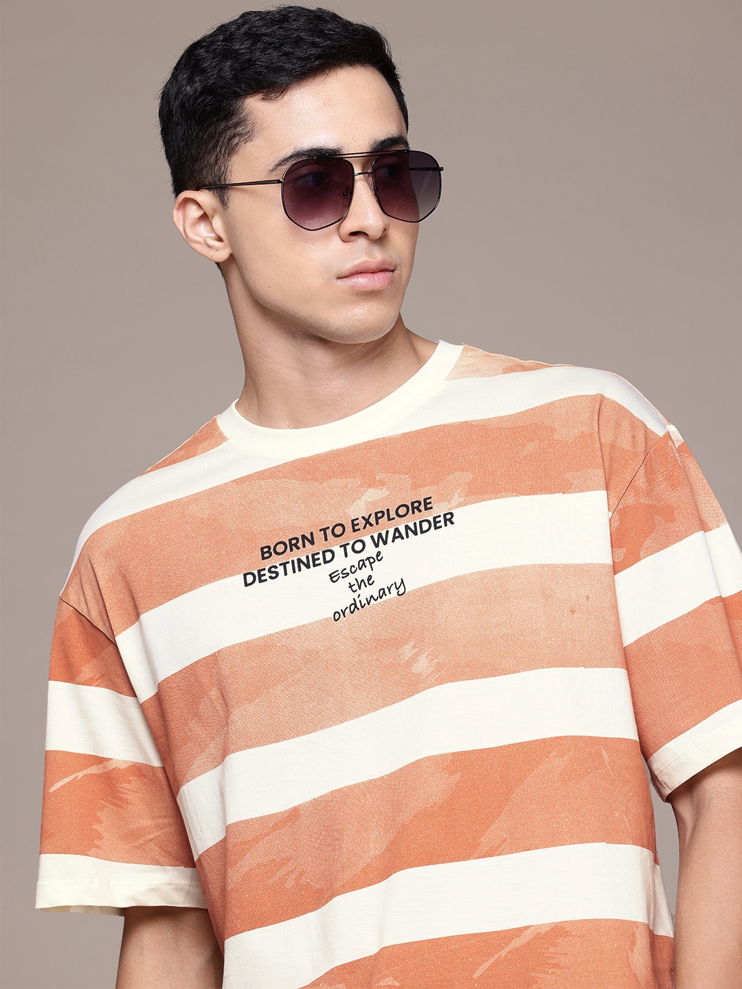 

The Roadster Lifestyle Co. Men Striped Relaxed Fit Pure Cotton T-shirt, Cream