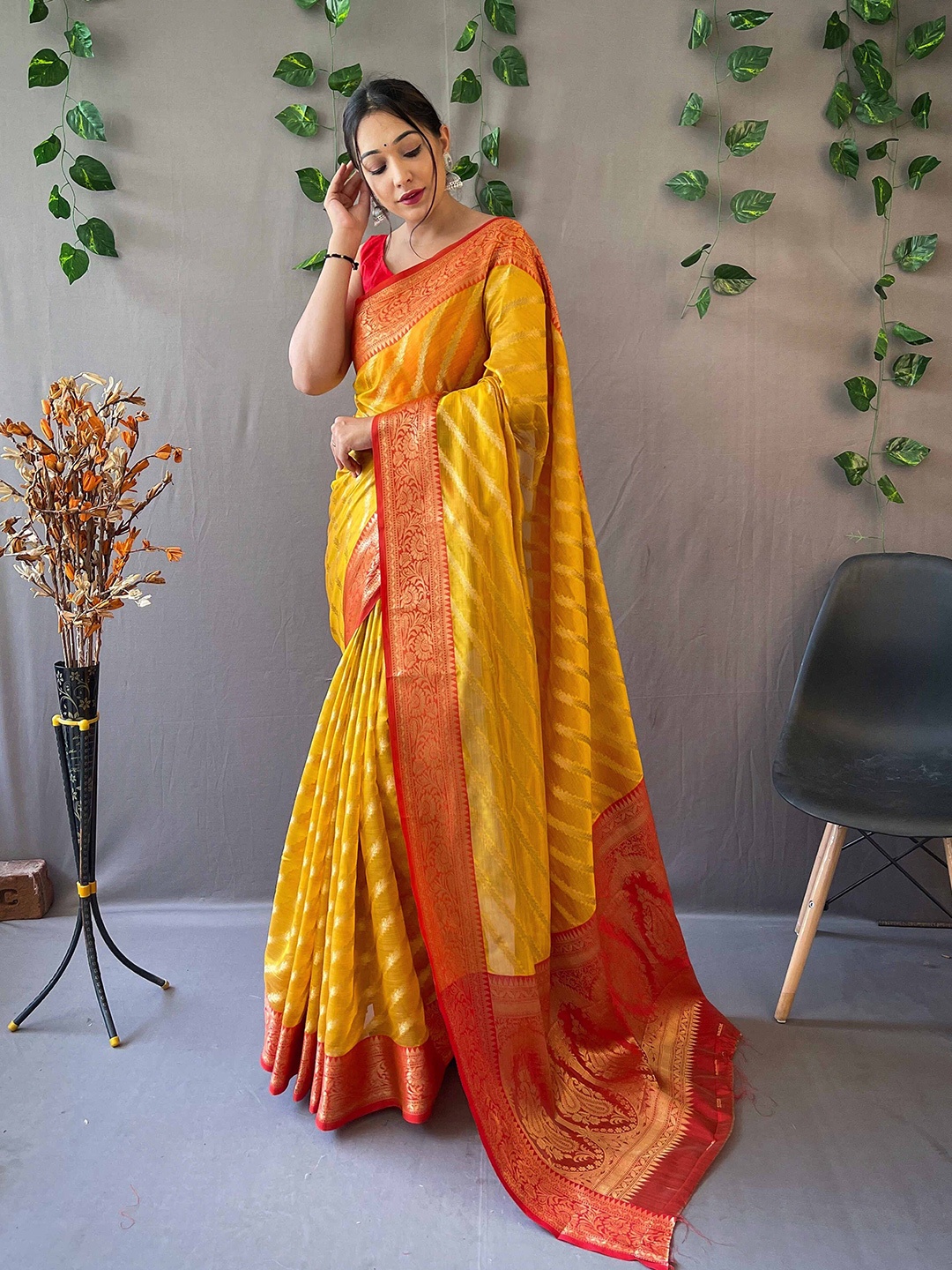 

DEVATITHI Woven Design Zari Organza Leheriya Saree, Yellow