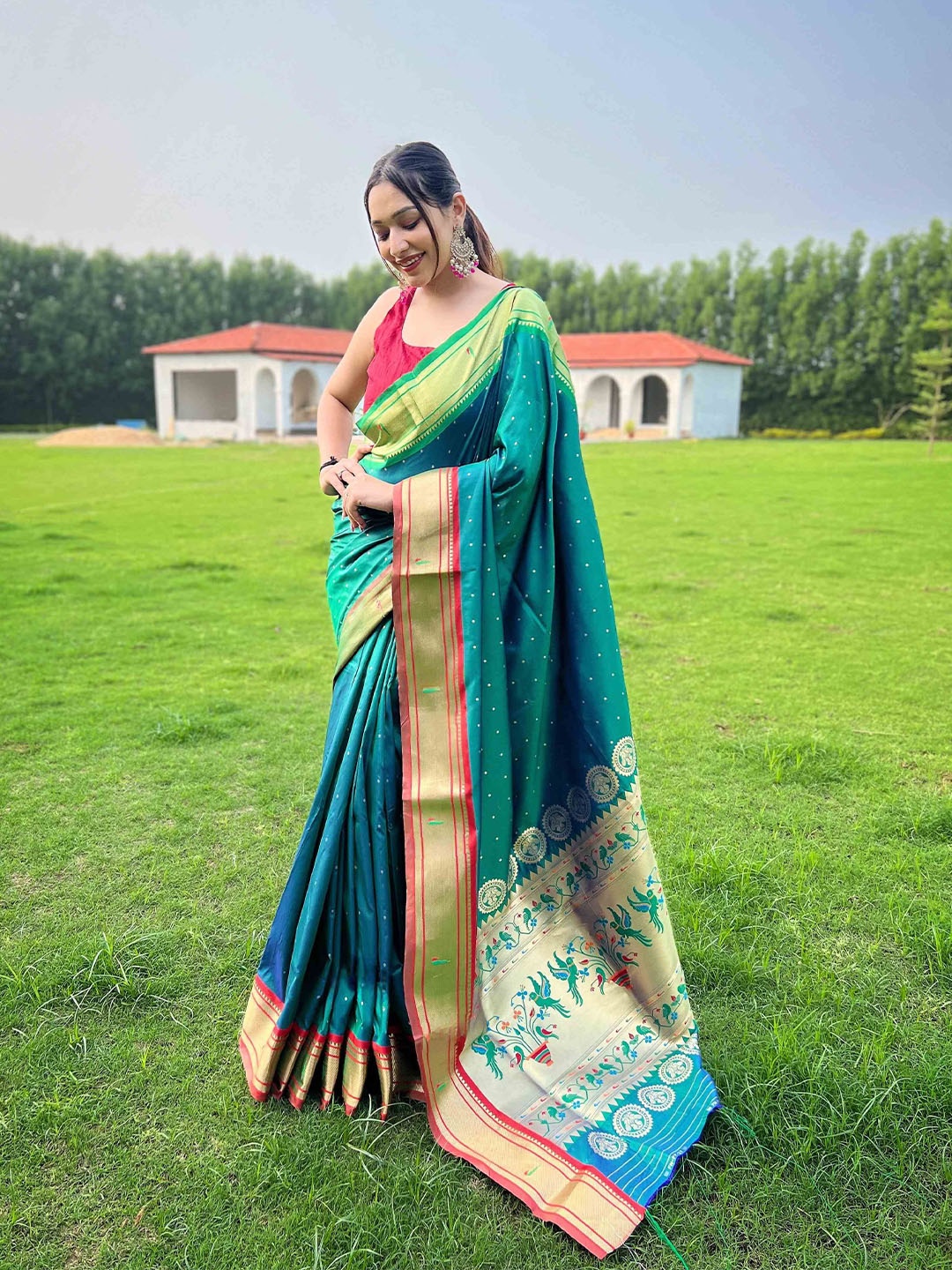 

DEVATITHI Woven Design Zari Patola Saree, Lime green