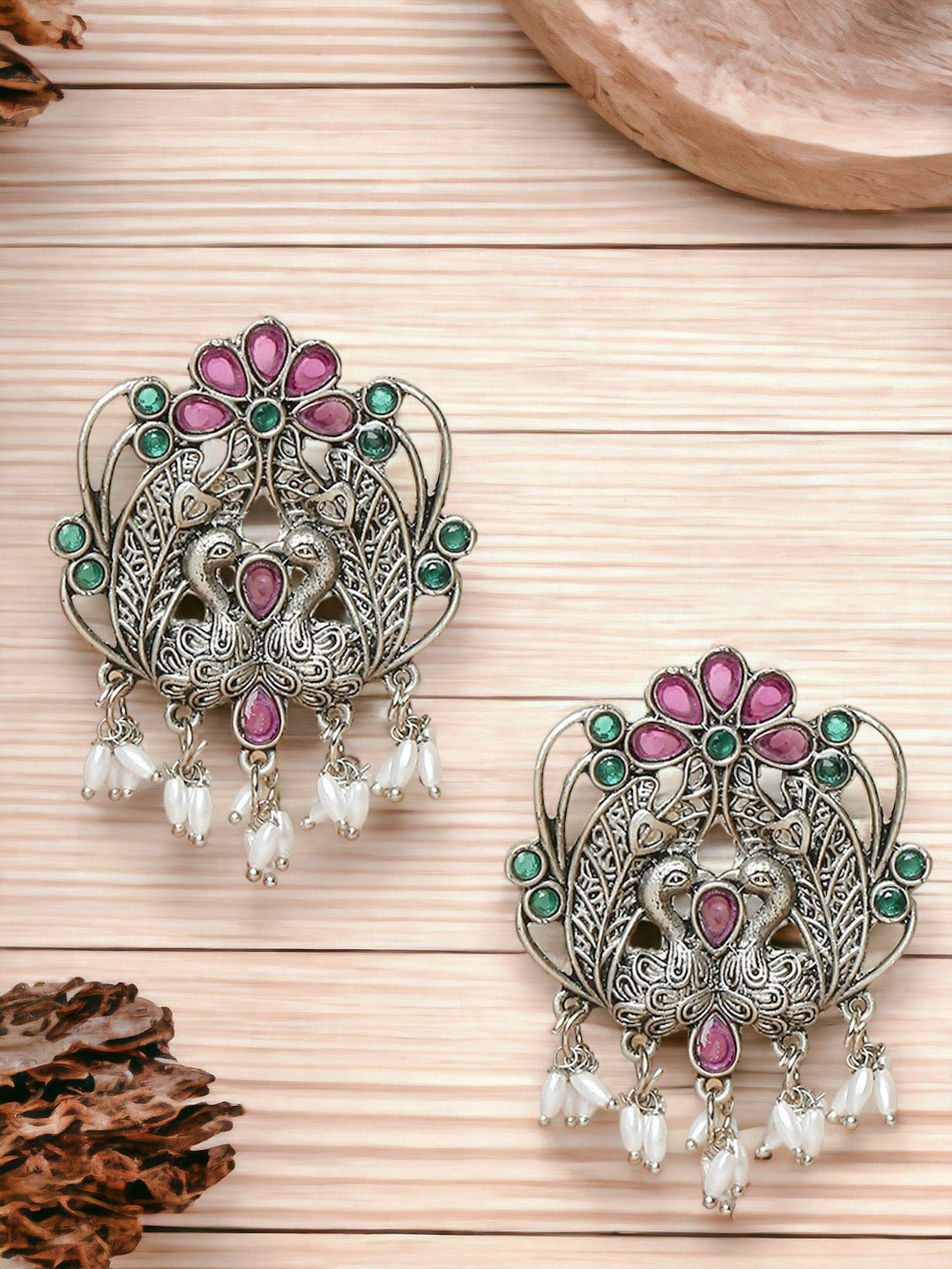 

Sangria Silver-Toned Stones Studded Beaded Peacock Shaped Oxidised Drop Earrings