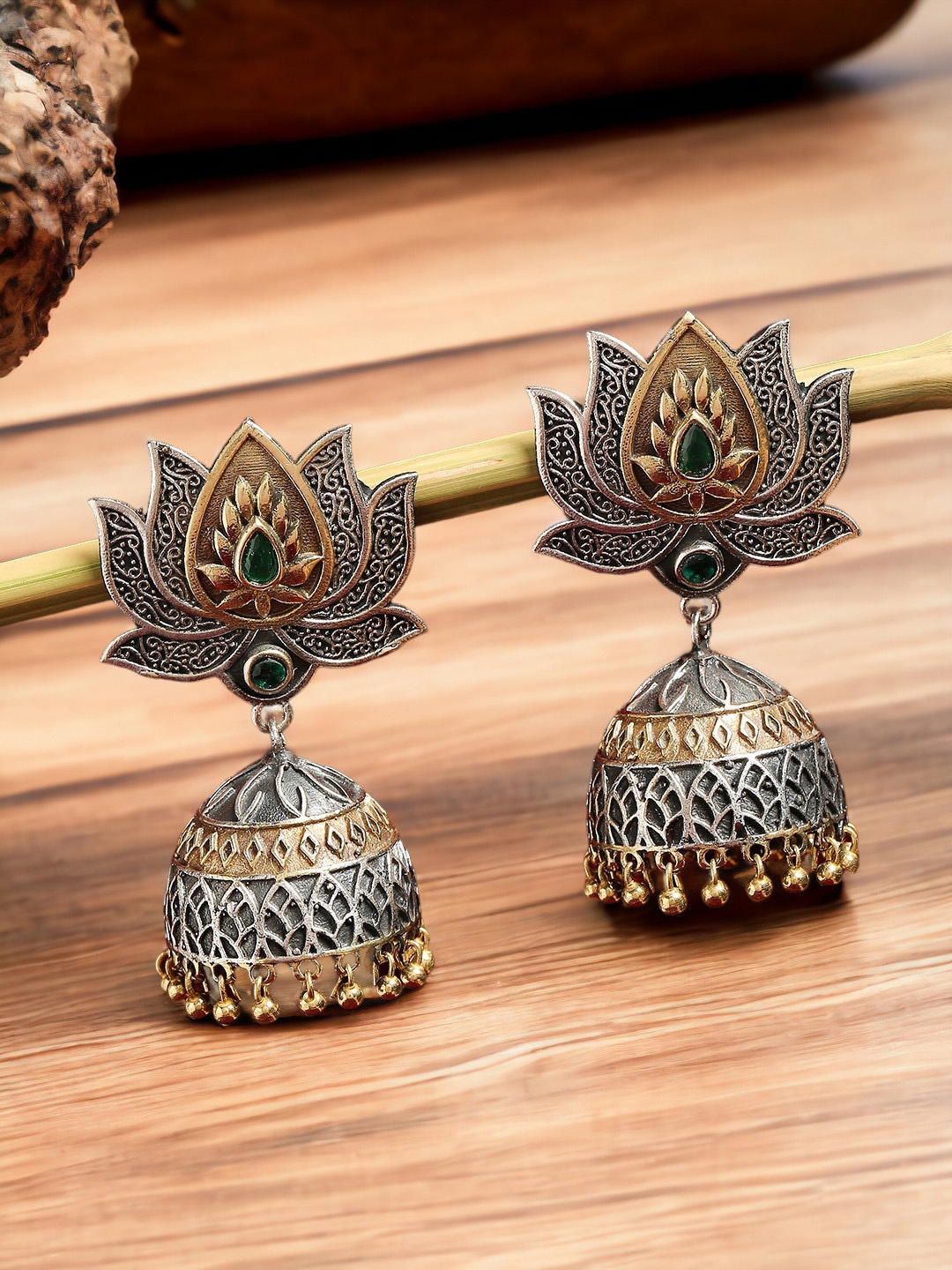 

Sangria Silver-Toned Stones Studded Dome Shaped Oxidised Jhumkas