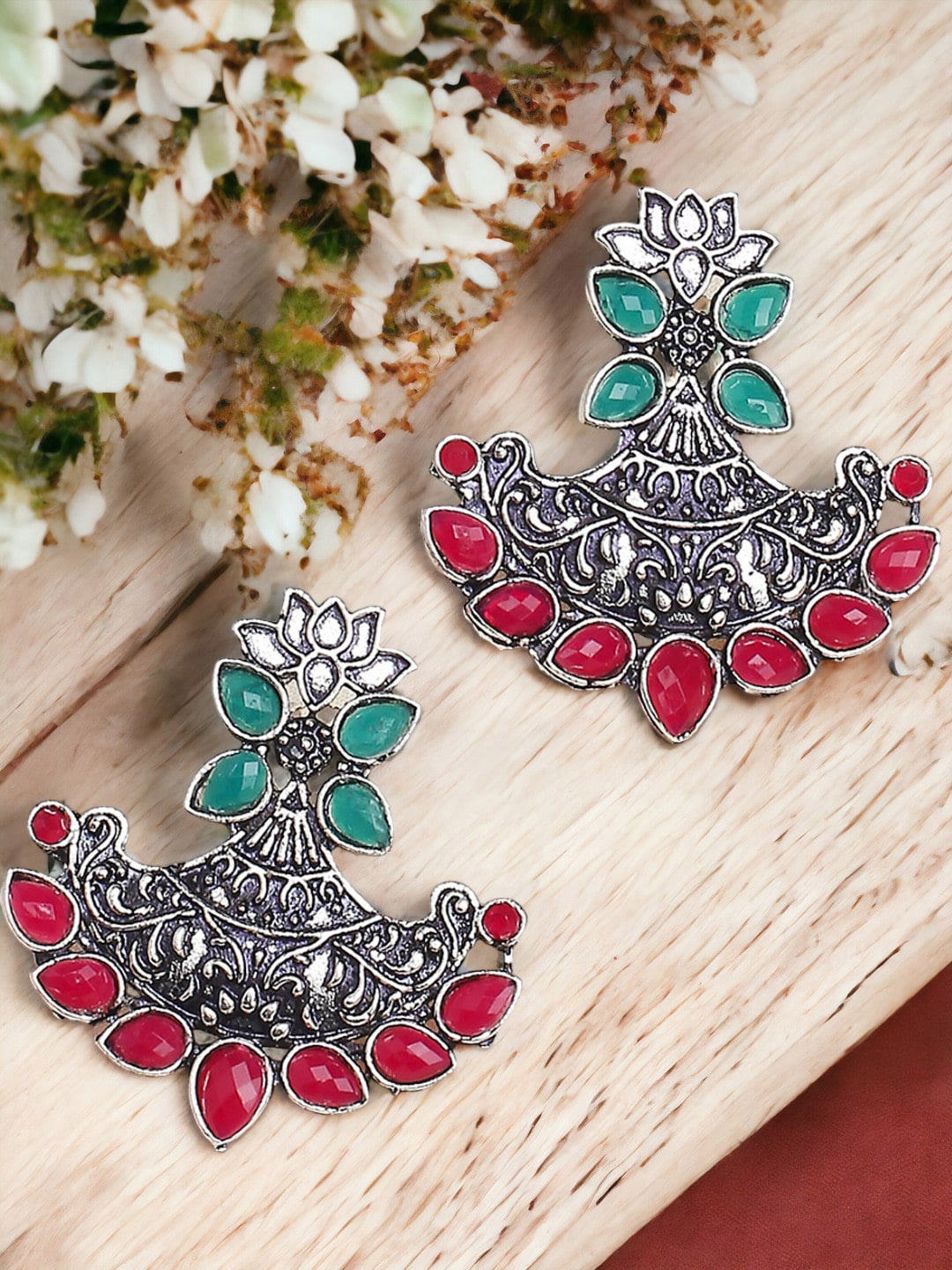 

Sangria Silver-Toned Stones Studded Oxidised Lotus Floral Drop Earrings