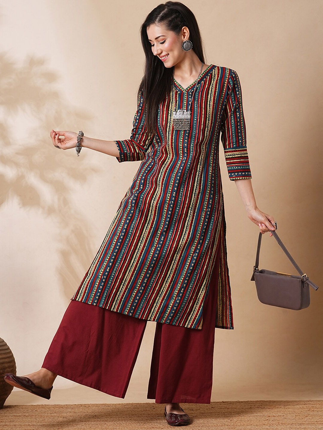 

Globus Maroon Printed Regular Pure Cotton Straight Kurta with Palazzos