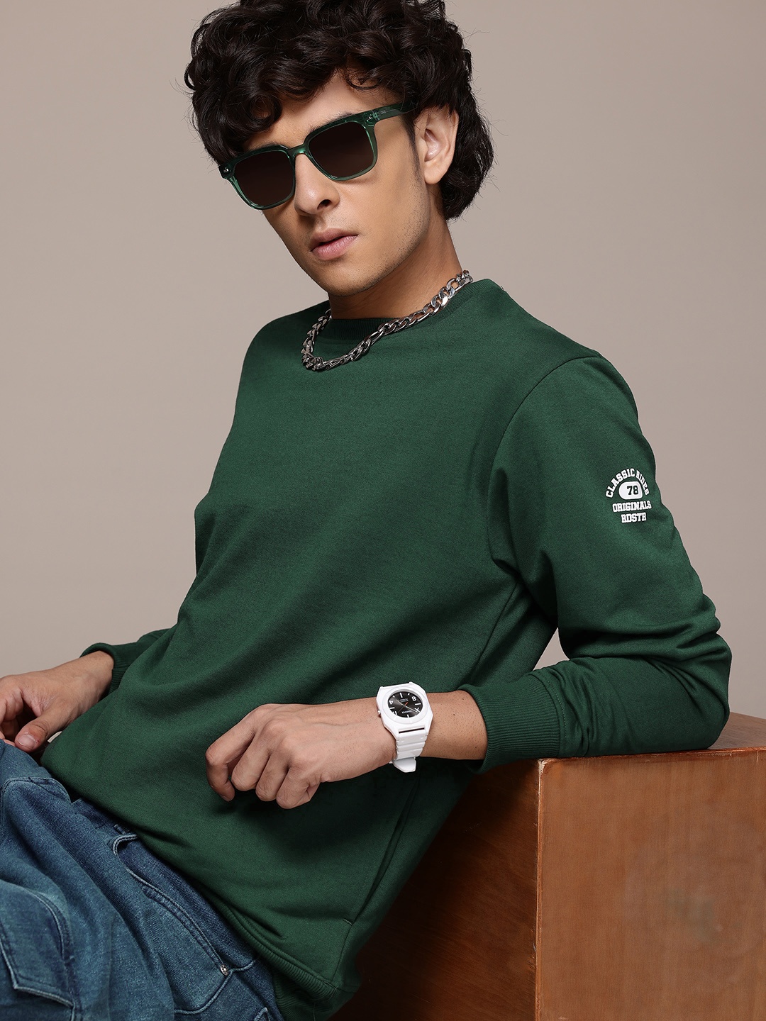 

The Roadster Lifestyle Co. Men Solid Sweatshirt, Green