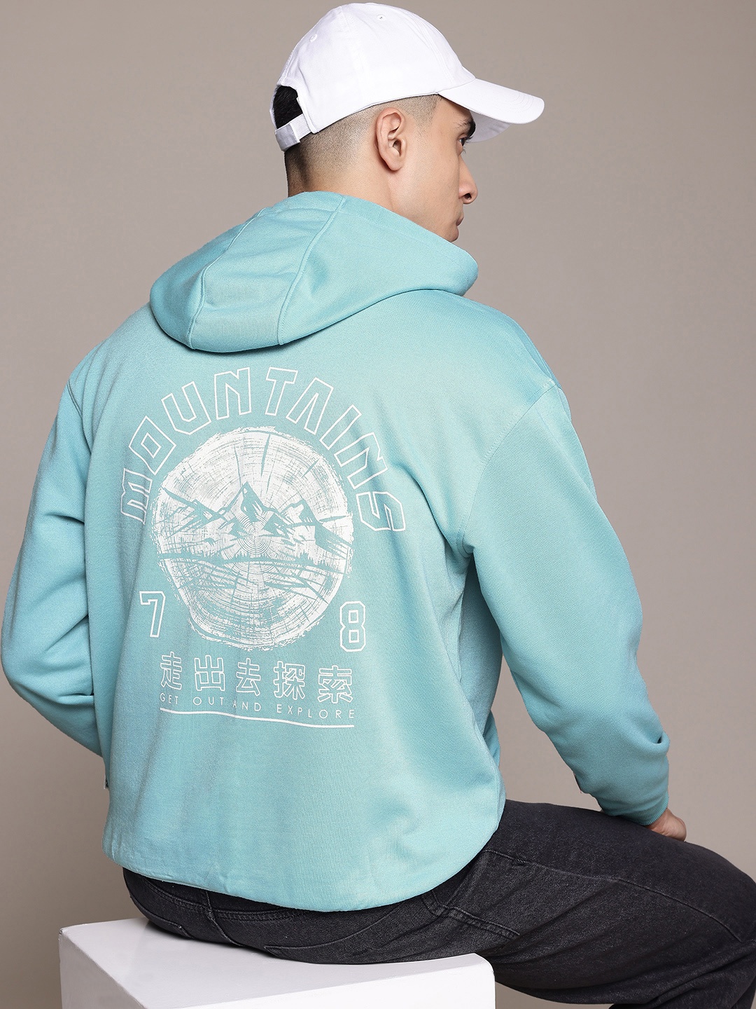 

The Roadster Lifestyle Co. Men Printed Hooded Sweatshirt, Blue
