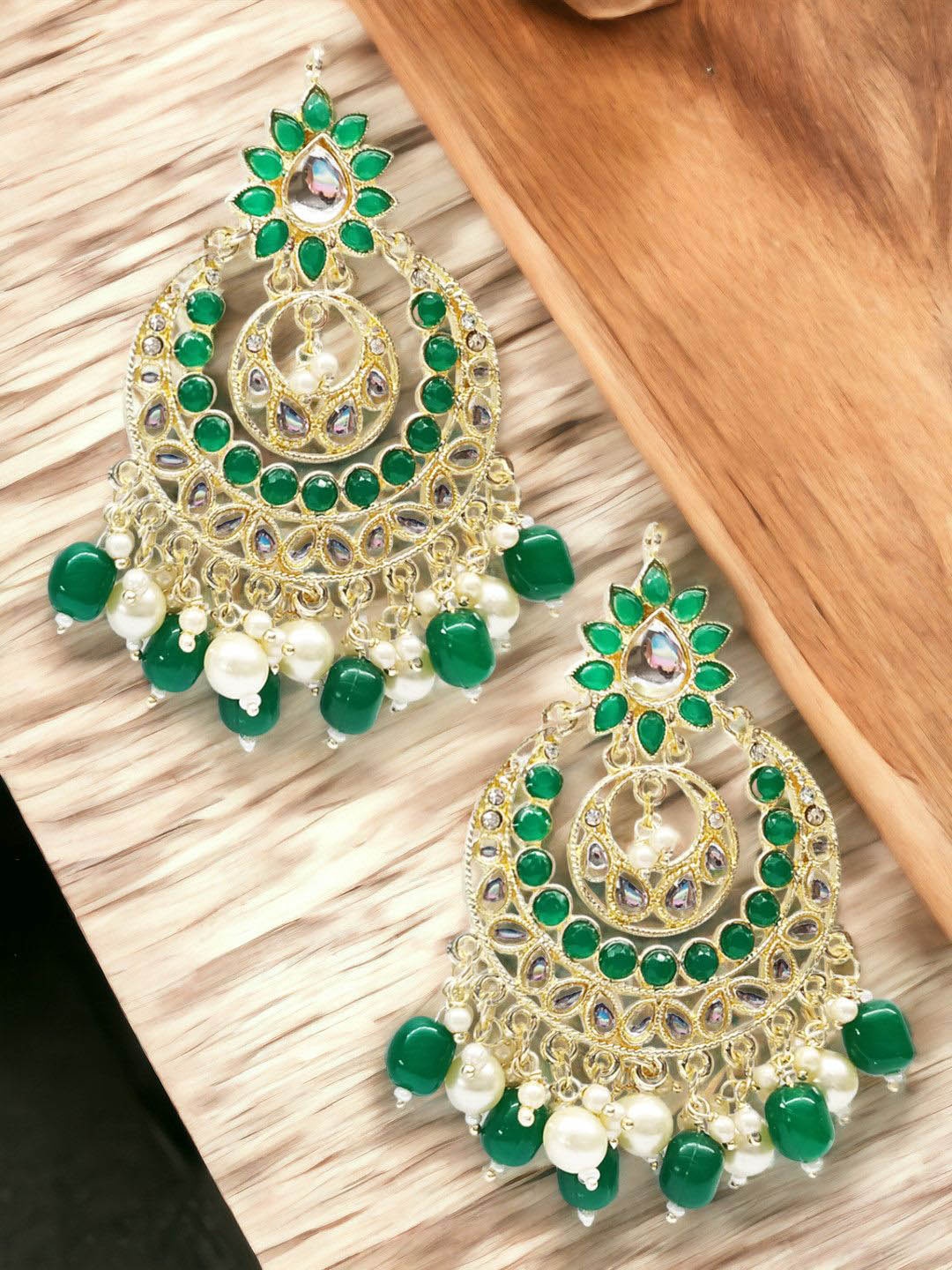 

Anouk Gold Toned Kundan Circular Chandbalis