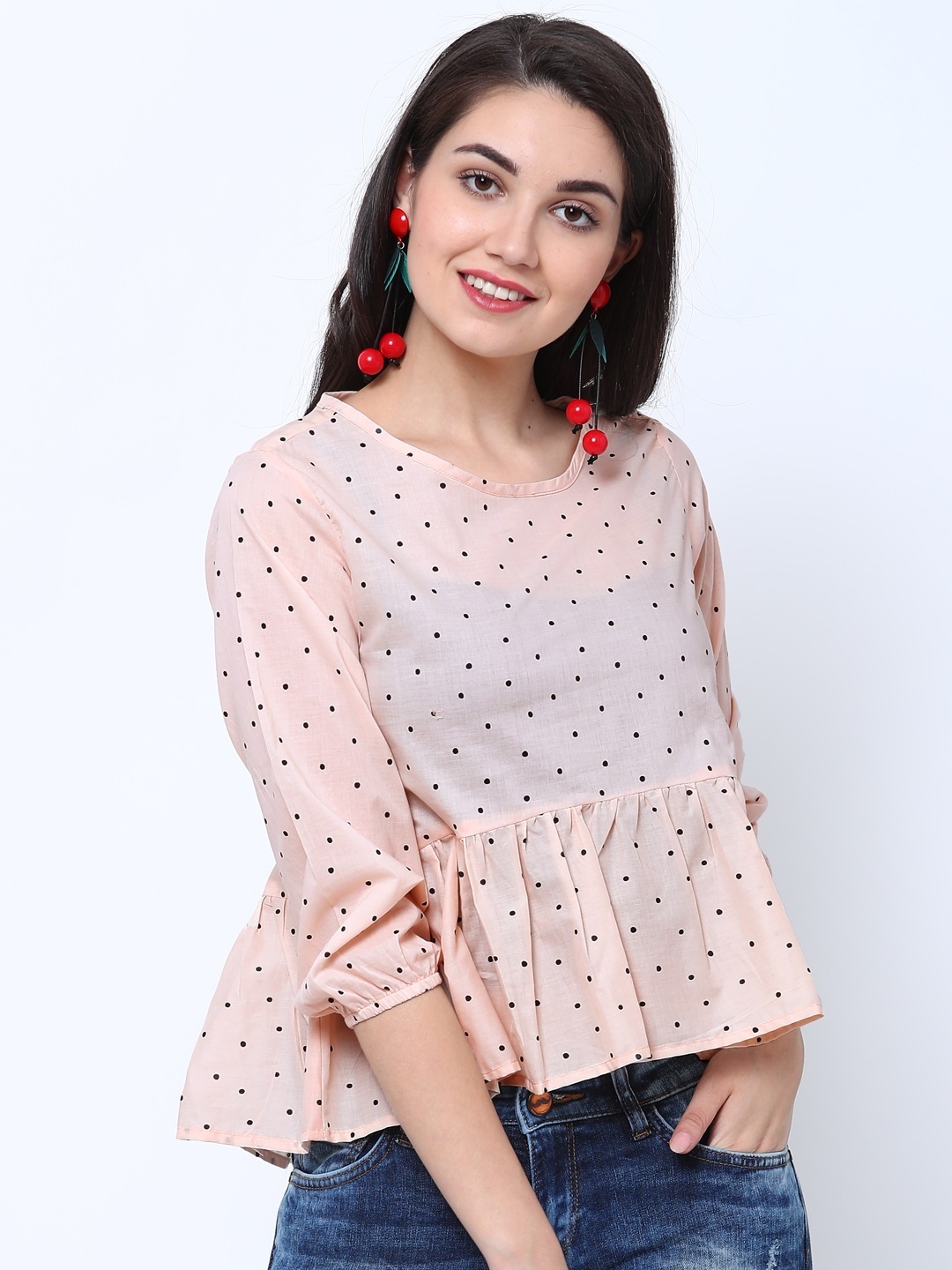 

Tokyo Talkies Women Peach-Coloured Printed Peplum Pure Cotton Top