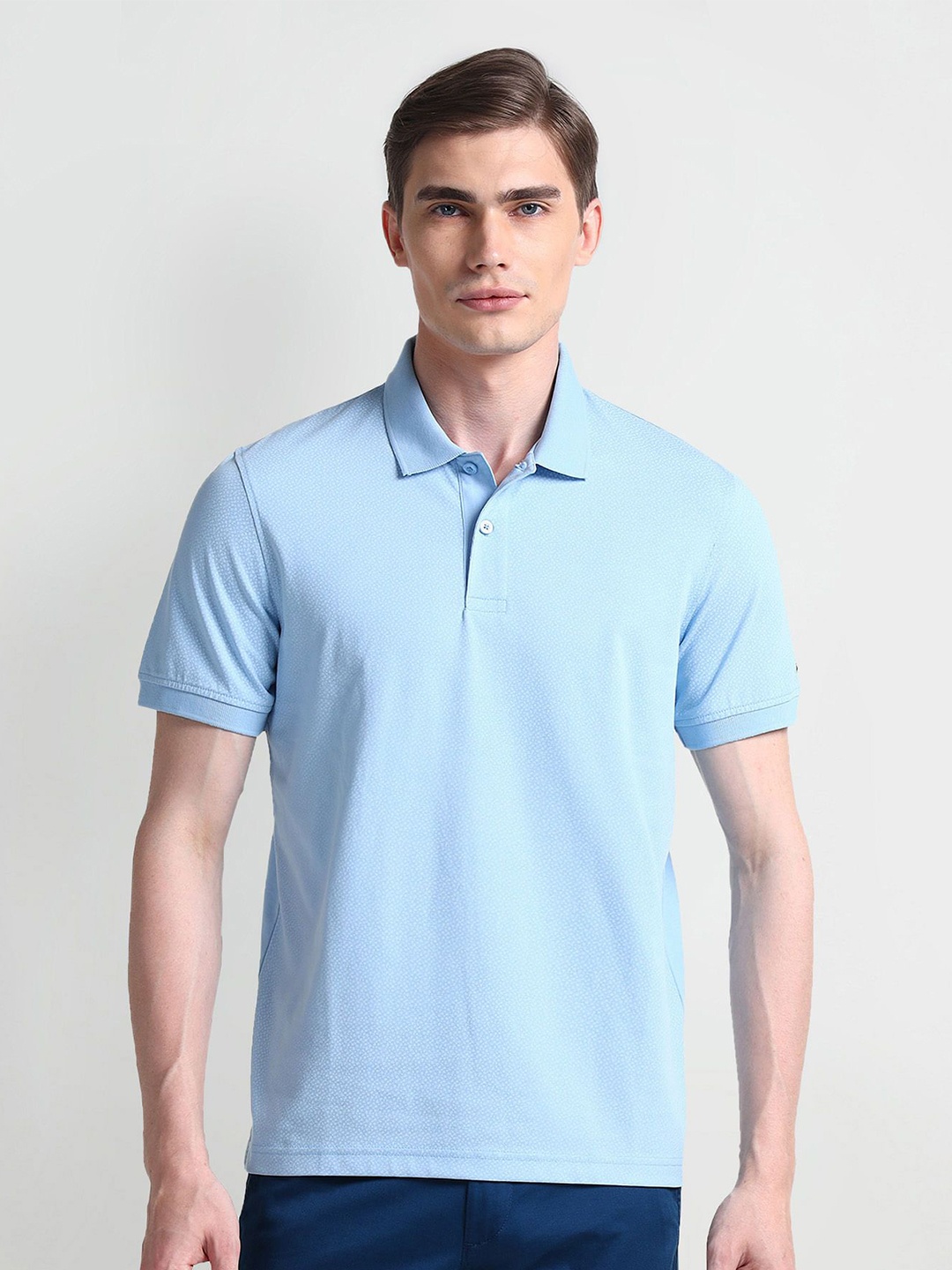 

Arrow Sport Men Solid Polo Collar T-shirt, Blue