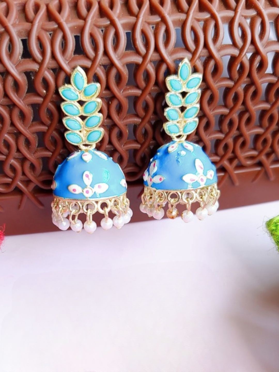 

Anouk Gold Toned & Blue Gold Plated Dome Shaped Meenakari Kundan Jhumkas