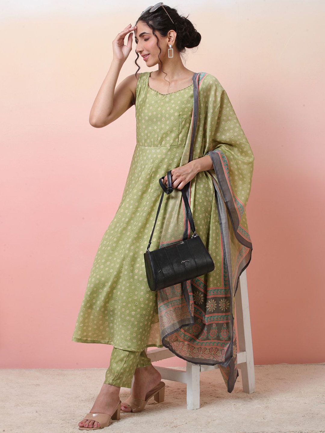 

Sangria Green Bandhani Printed Sleeveless Anarkali Kurta With Trousers & Dupatta