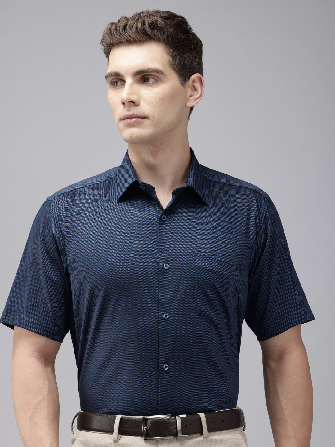 

Van Heusen Custom Fit Textured Self Design Formal Shirt, Blue