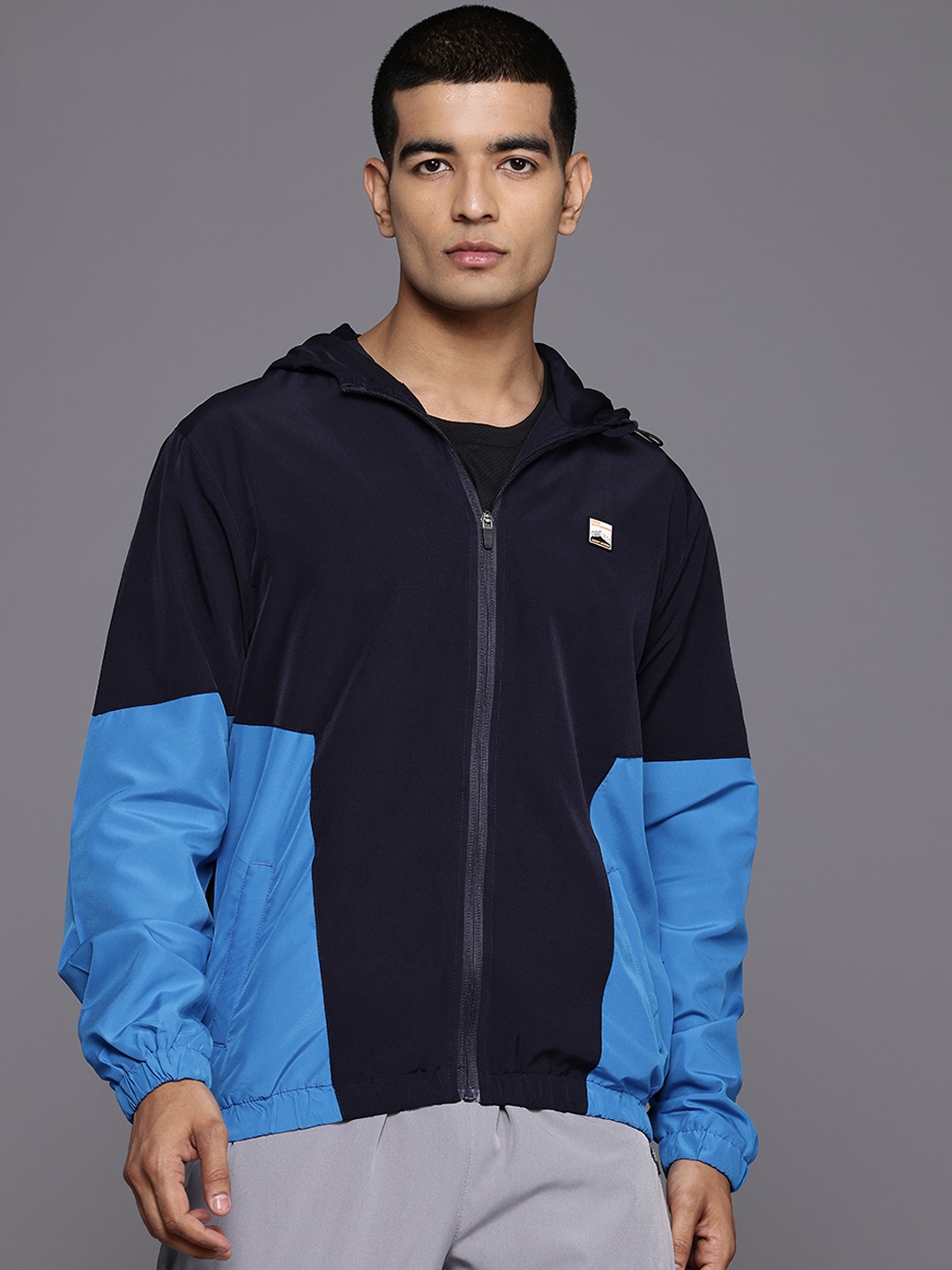 

HRX by Hrithik Roshan Colourblocked Rapid-Dry Hooded Outdoor Jacket, Blue