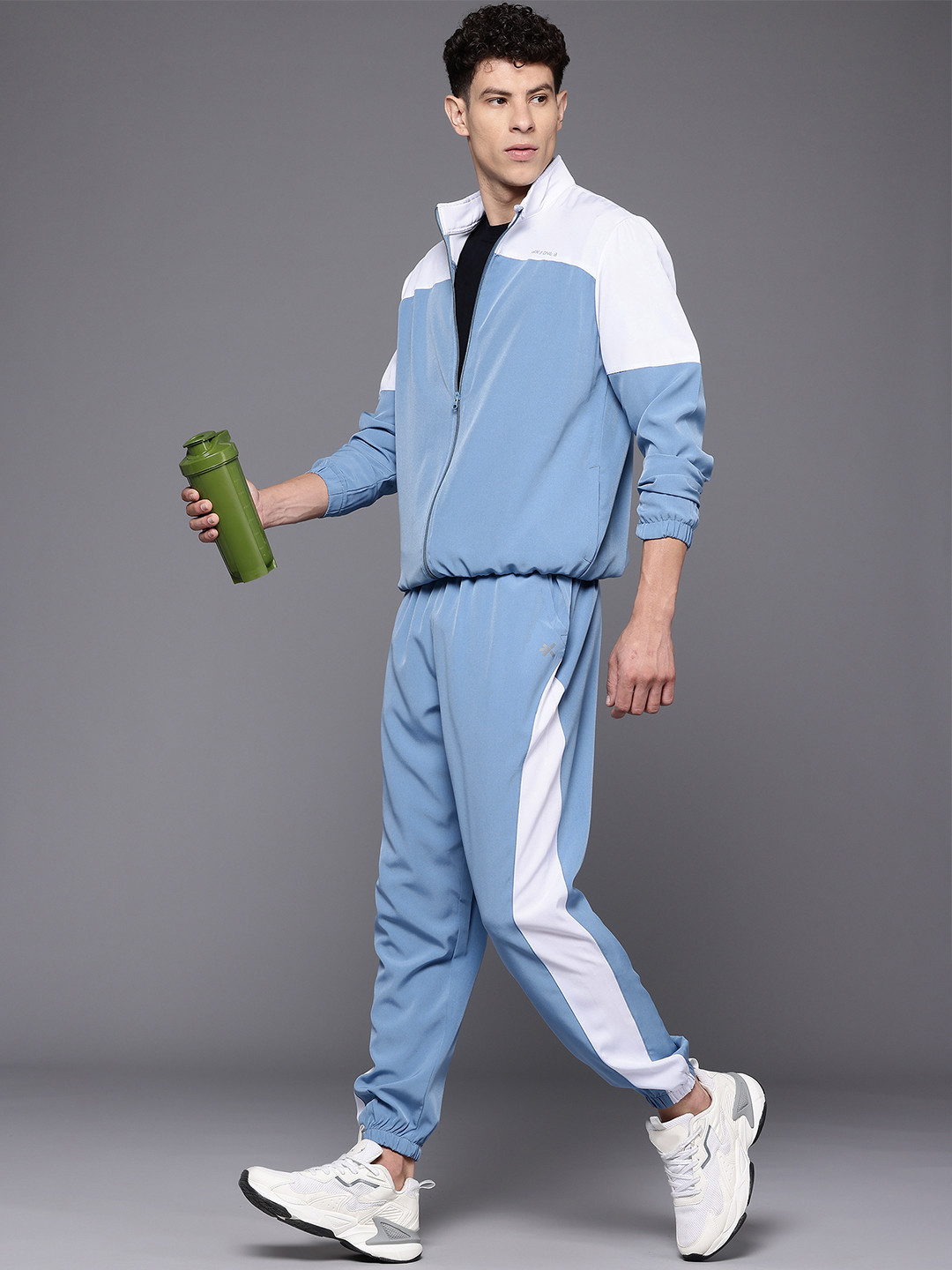 

HRX by Hrithik Roshan Men Blue & White Colourblocked Running Tracksuits