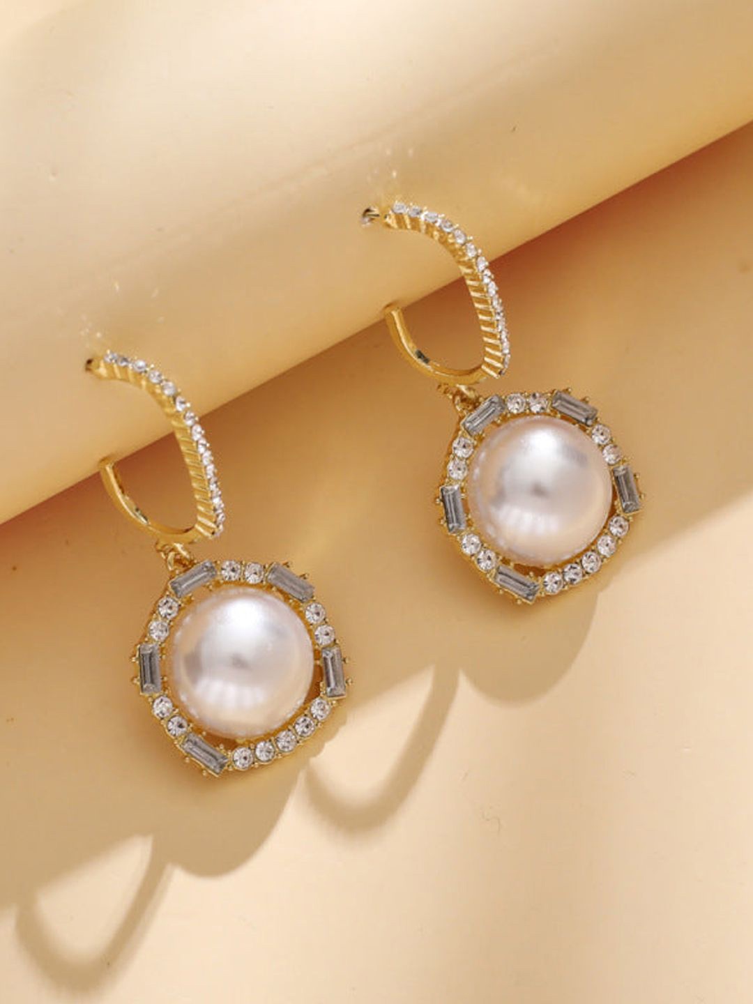 

Xivir Gold-Plated American Diamond Contemporary Drop Earrings