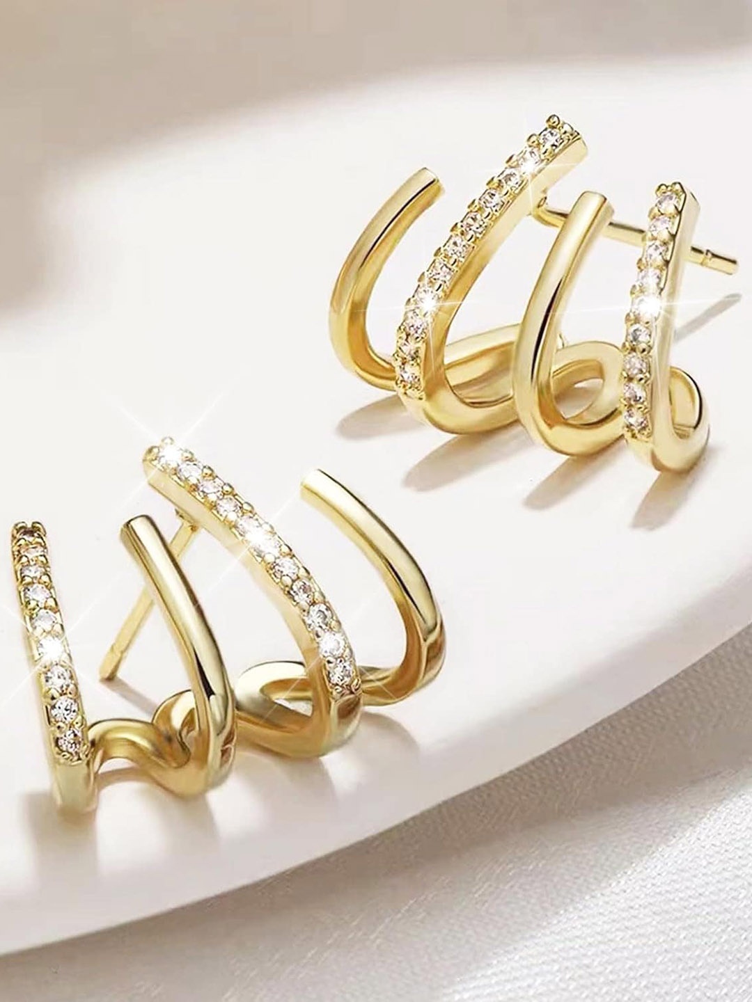 

Xivir Gold-Plated Cubic Zirconia Studded Contemporary Claw Ear Cuff Earrings