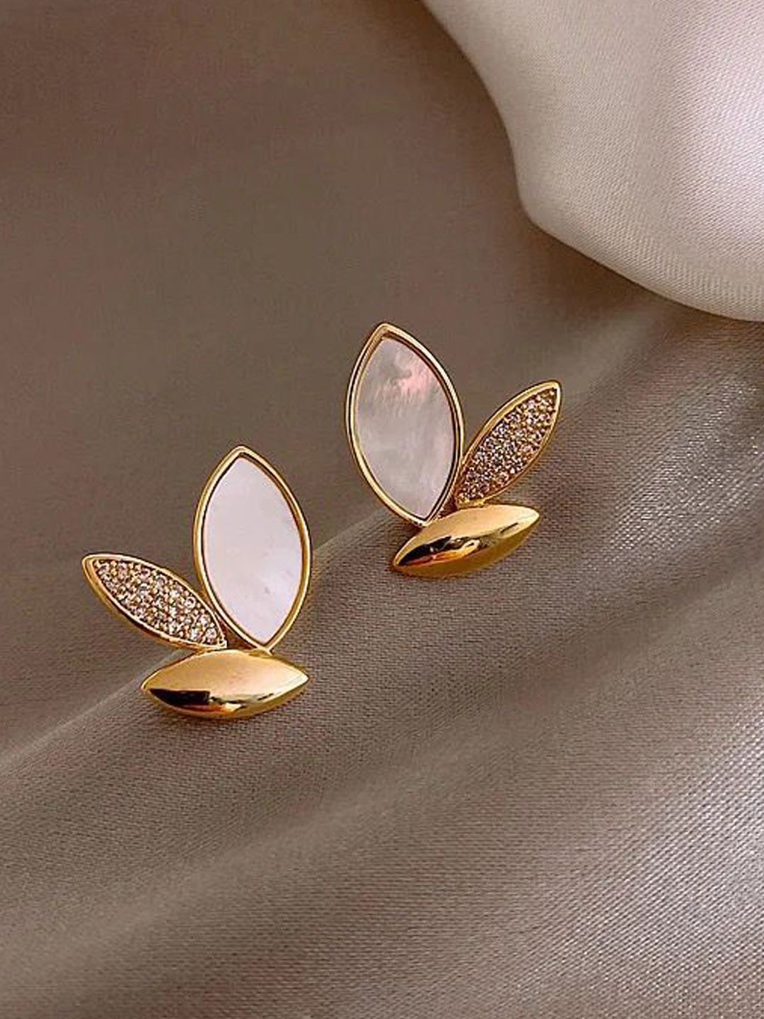

Xivir Gold-Plated Stones Studded Leaf Shaped Stud Earrings