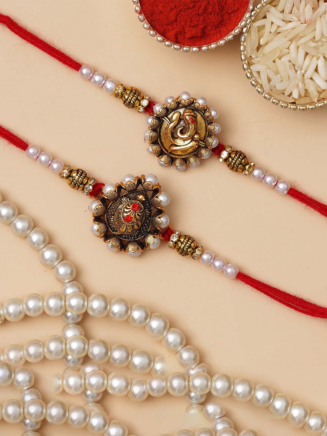 

eCraftIndia Men Set of 2 Lord Ganesha Beaded Rakhis With Roli Chawal, Gold