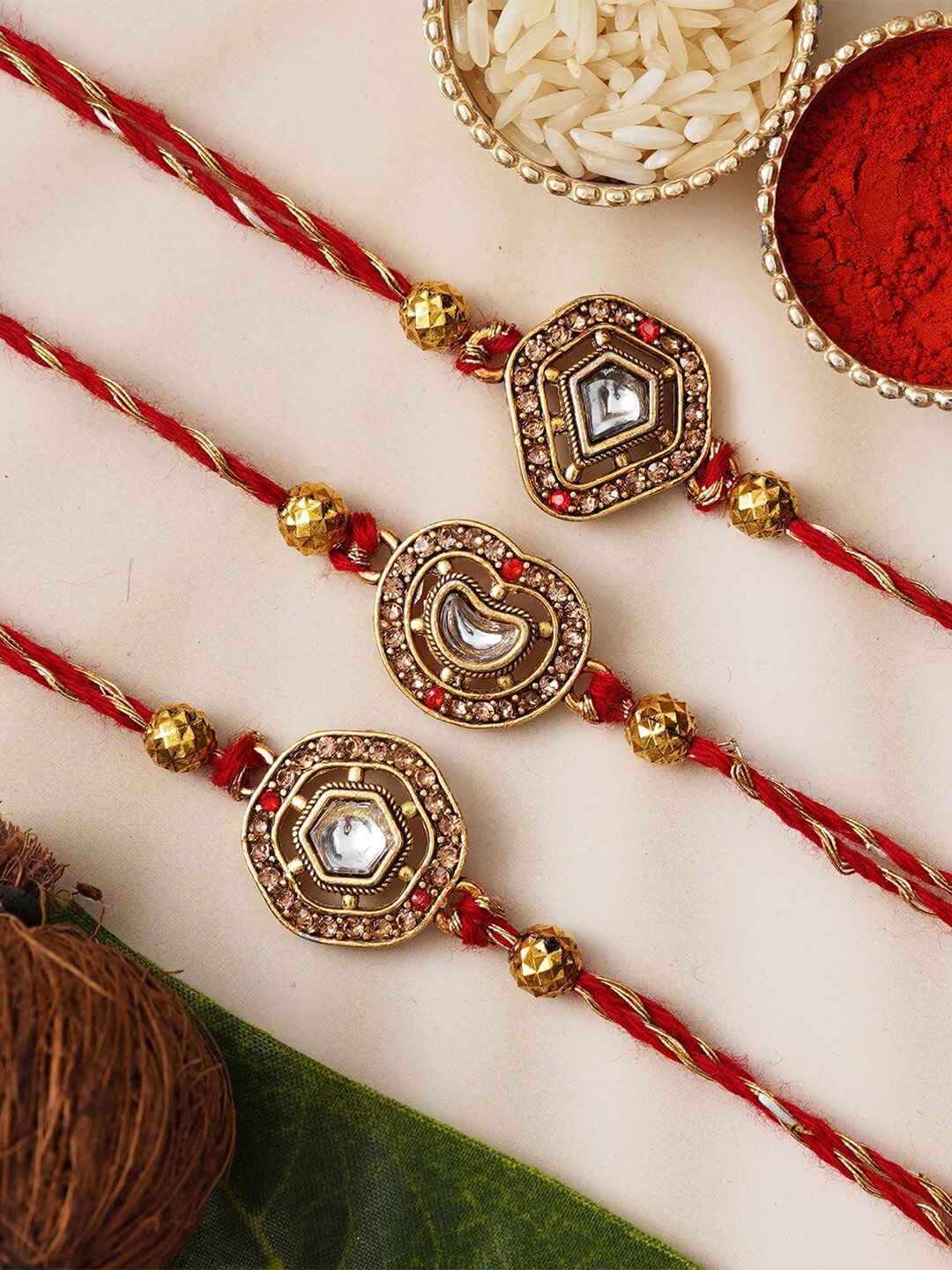 

eCraftIndia Set of 3 Kundan Beaded Designer Rakhis for Brothers with Roli Chawal Pack, Red